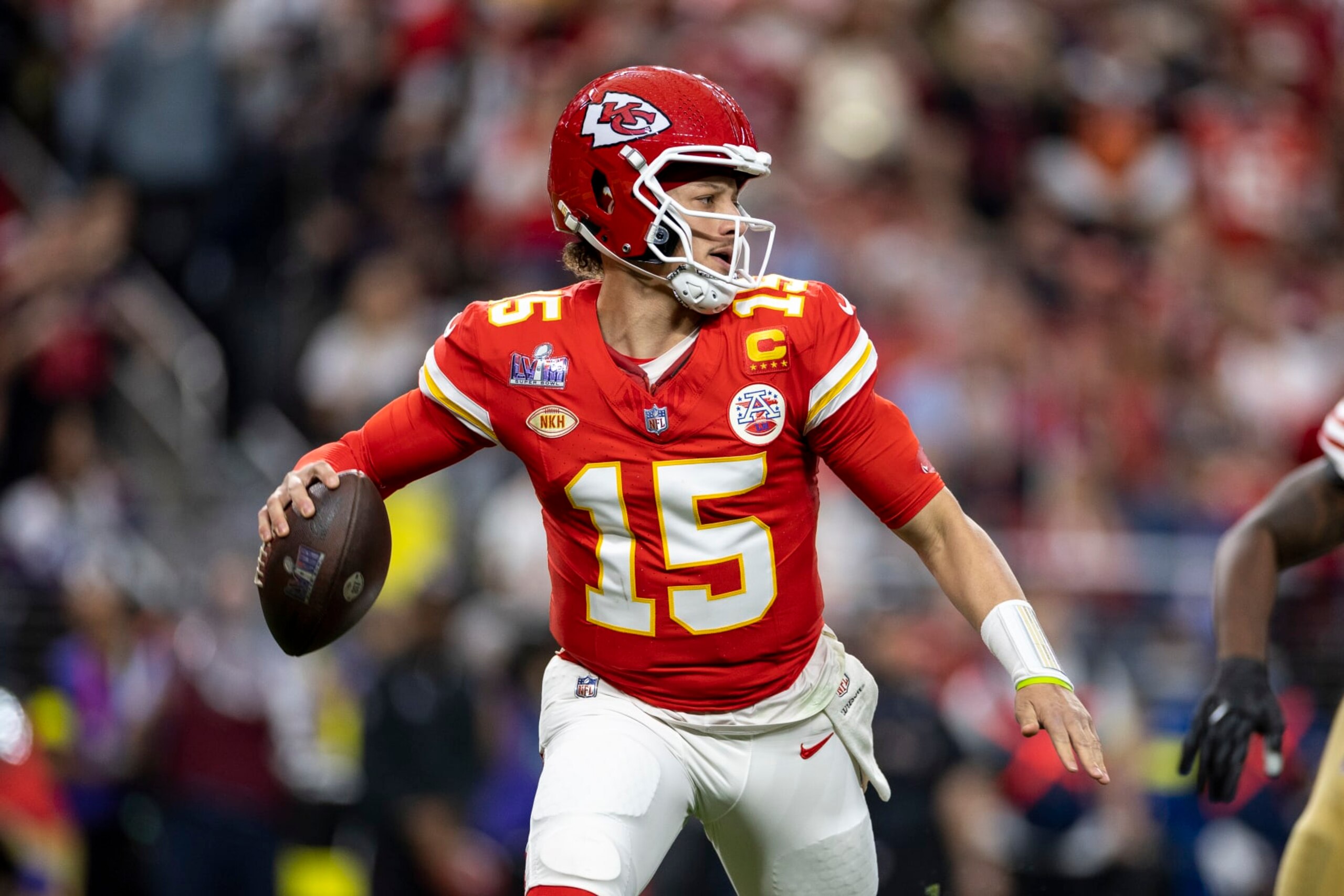 LAS VEGAS, NEVADA - FEBRUARY 11: Patrick Mahomes #15 of the Kansas City Chiefs scrambles and looks to pass during the NFL Super Bowl 58 football game between the San Francisco 49ers and the Kansas City Chiefs at Allegiant Stadium on February 11, 2024 in Las Vegas, Nevada. (Photo by Michael Owens/Getty Images)