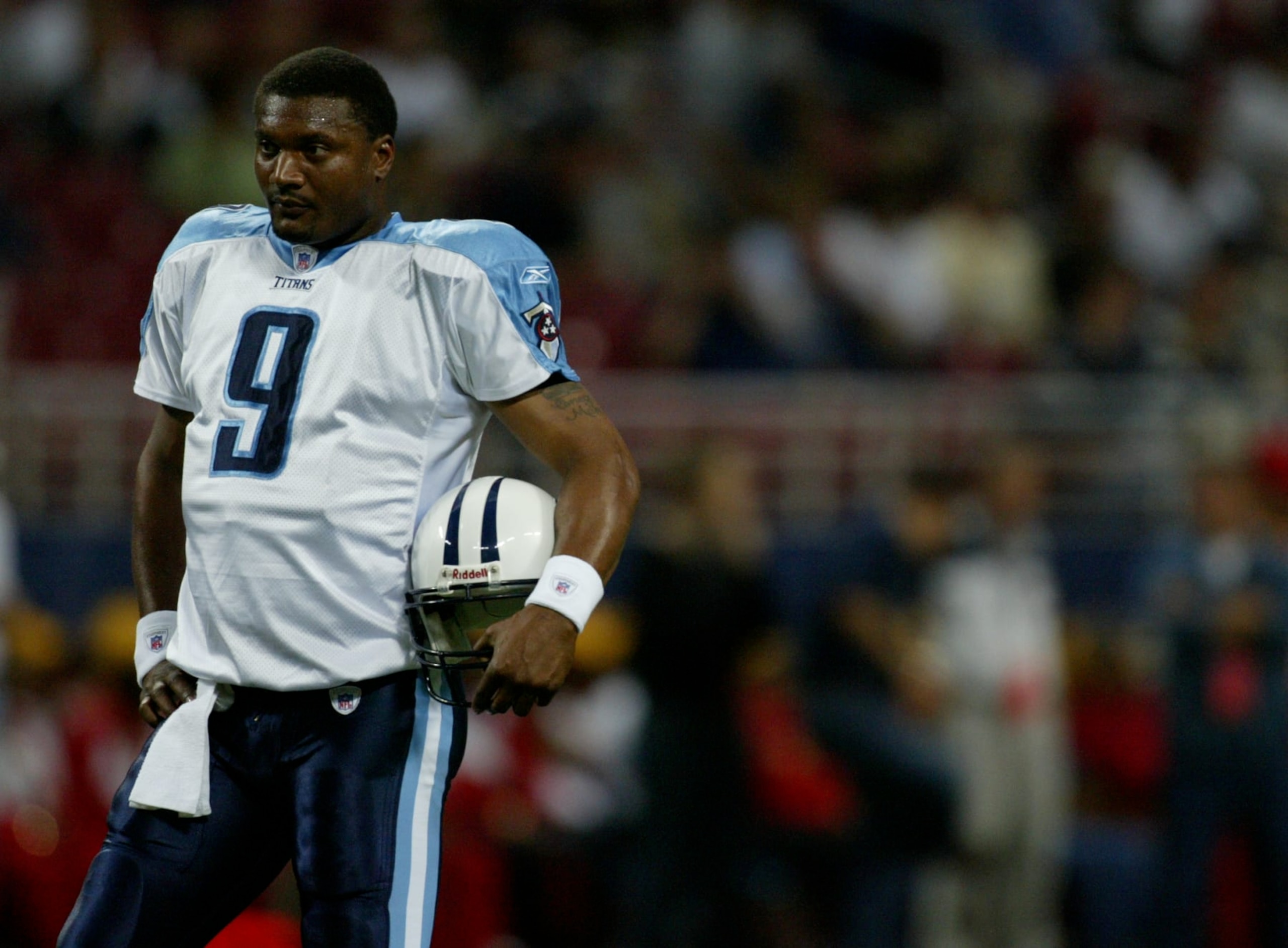 STEVE MCNAIR (Feb 14, 1973 - Jul 4, 2009), American National Football League (NFL) quarterback from 1995-2008 when he retired. McNair plaed for the Houston Oilers, Tennessee Titans and the Baltimore Ravens and was the second black quarterback to start in a superbowl game. In college McNair plaed for Alcorn State Universit and won the Walter Paton Award in 1994 and finished third in the Heisman Troph voting. McNair suffered a fatal gunshot wound to the head in downtown Nashville in an apparent double homicide. A female victim was also found dead. PICTURED: Sep 25, 2005 - St. Louis, Missouri, USA - Tennessee Titans Steve McNair against St. Louis Rams. The Rams won 31-27.  (Photo by Michael Mcnamara/Sporting News via Getty Images via Getty Images)