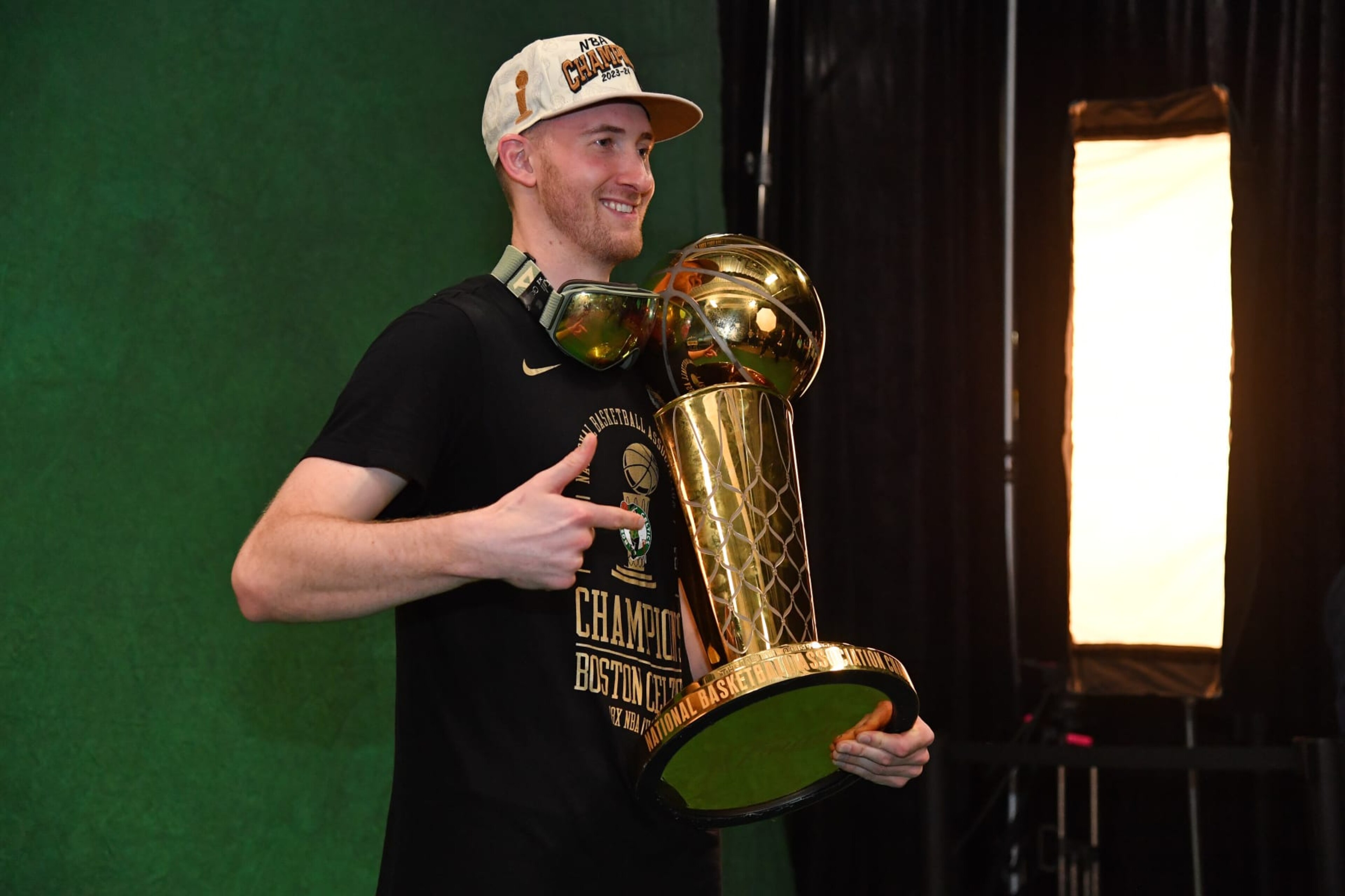 BOSTON, MA - JUNE 17: Sam Hauser #30 of the Boston Celtics poses with the Larry O'Brien Trophy after the game against the Dallas Mavericks during Game 5 of the 2024 NBA Finals on June 17, 2024 at the TD Garden in Boston, Massachusetts. NOTE TO USER: User expressly acknowledges and agrees that, by downloading and or using this photograph, User is consenting to the terms and conditions of the Getty Images License Agreement. Mandatory Copyright Notice: Copyright 2024 NBAE (Photo by Juan Ocampo/NBAE via Getty Images) BOSTON, MA - JUNE 17: Sam Hauser #30 of the Boston Celtics poses with the Larry O'Brien Trophy after the game against the Dallas Mavericks during Game 5 of the 2024 NBA Finals on June 17, 2024 at the TD Garden in Boston, Massachusetts. NOTE TO USER: User expressly acknowledges and agrees that, by downloading and or using this photograph, User is consenting to the terms and conditions of the Getty Images License Agreement. Mandatory Copyright Notice: Copyright 2024 NBAE (Photo by Juan Ocampo/NBAE via Getty Images)
