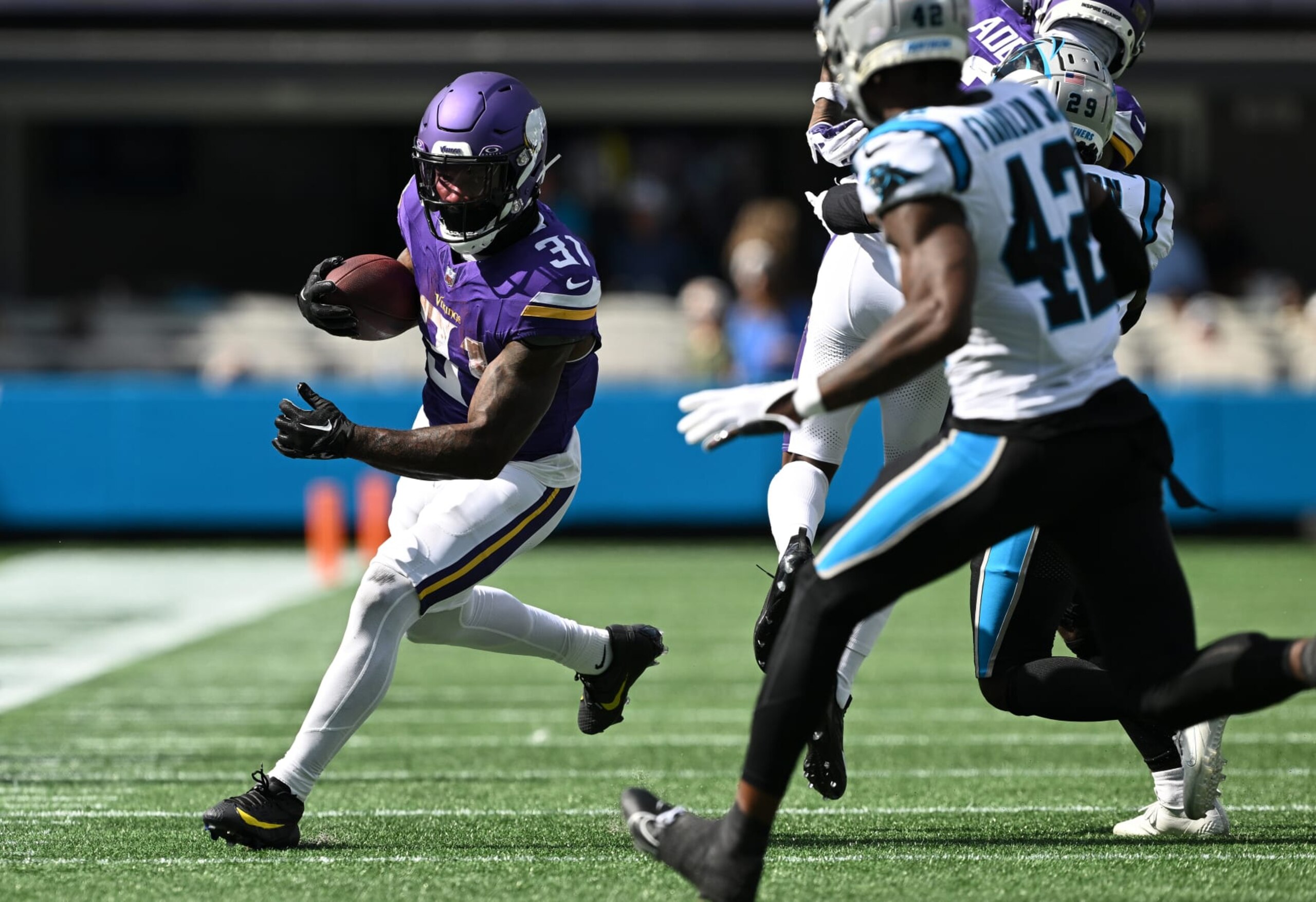 CHARLOTTE, NORTH CAROLINA - OCTOBER 01: Cam Akers #31 of the Minnesota Vikings runs against the Carolina Panthers during the third quarter at Bank of America Stadium on October 01, 2023 in Charlotte, North Carolina. (Photo by Grant Halverson/Getty Images)