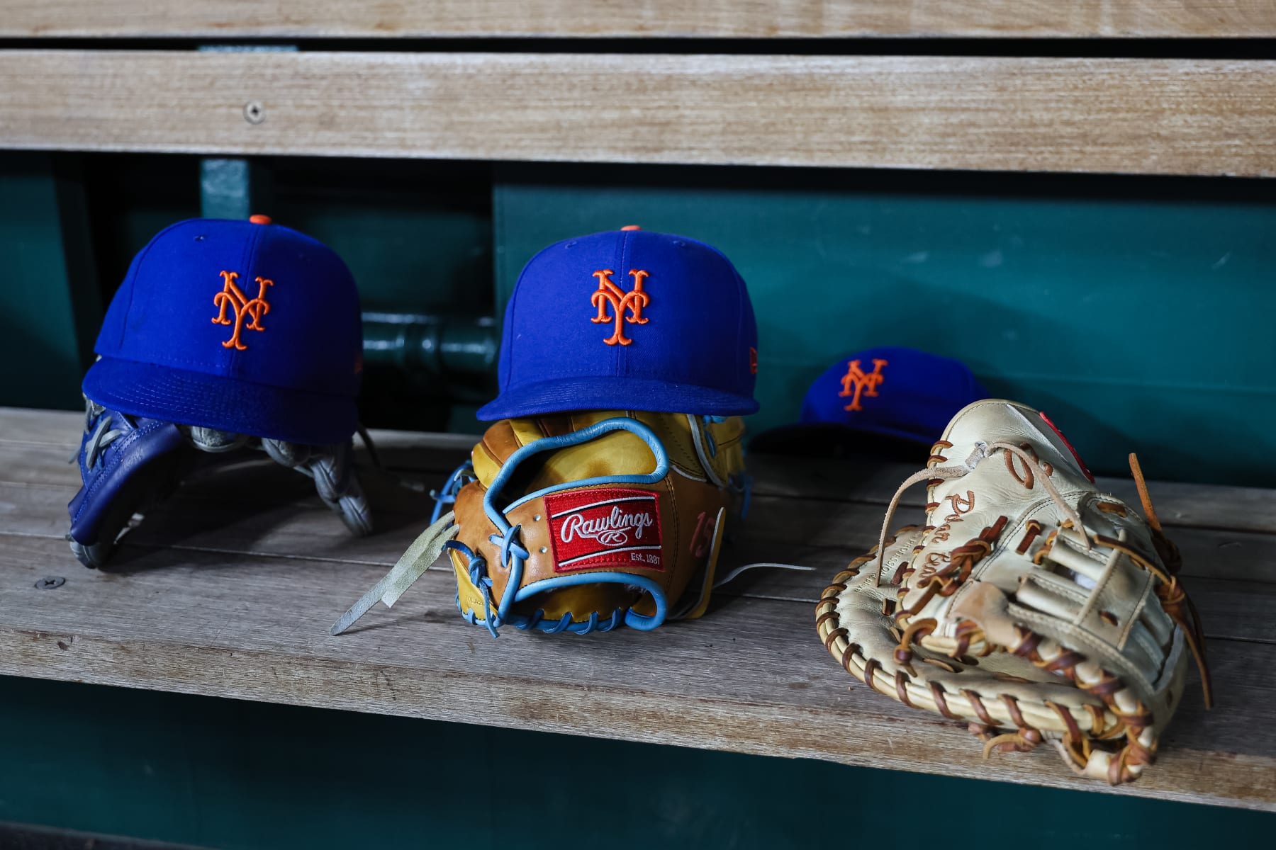 WASHINGTON, DC - JULY 02: A general view of New York Mets hats and gloves in the dugout during the ninth inning of the game between the Washington Nationals and the New York Mets at Nationals Park on July 2, 2024 in Washington, DC. (Photo by Scott Taetsch/Getty Images)