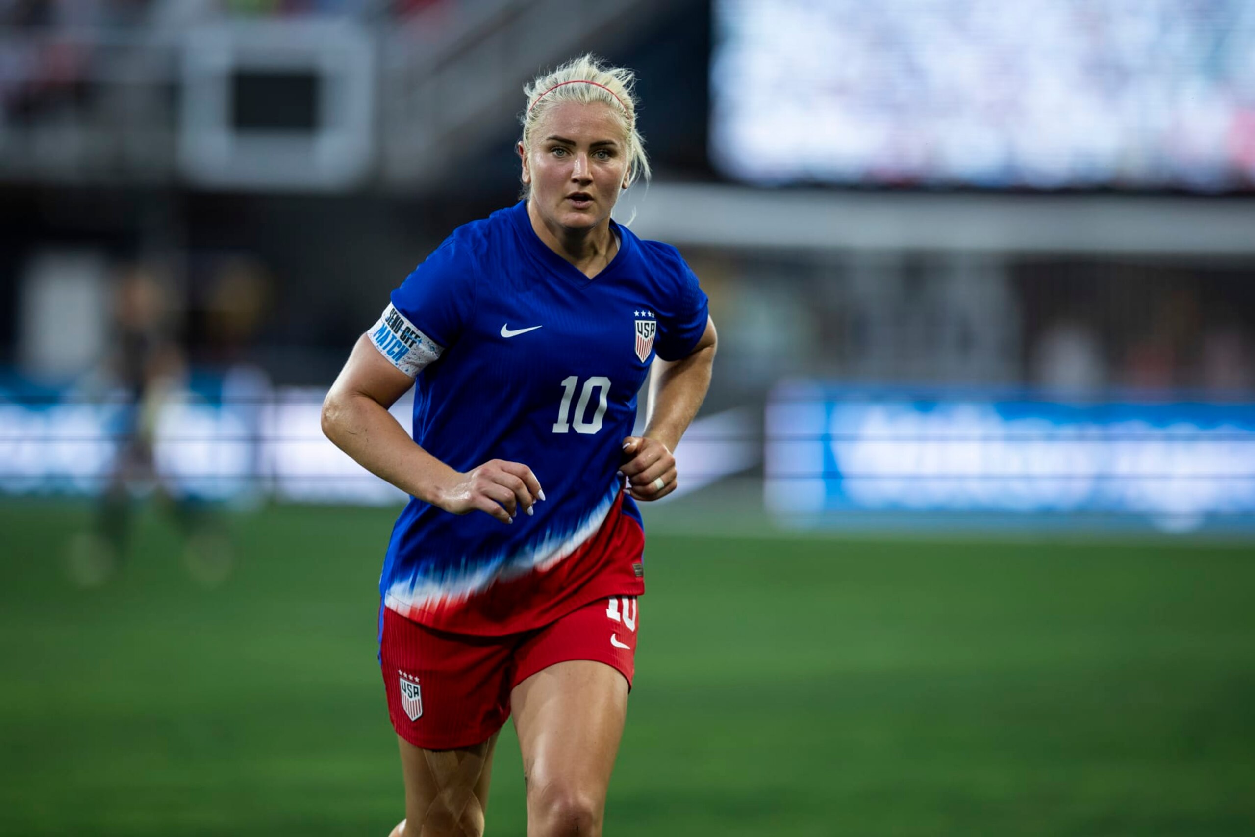 WASHINGTON, DC - JULY 16: Captain Lindsey Horan #10 of United States runs down the pitch in the first half of the International Friendly for the 2024 Olympics Send Off Match between the United States and Costa Rica at Audi Field on July 16, 2024 in Washington, DC. (Photo by Ira L. Black - Corbis/Getty Images)