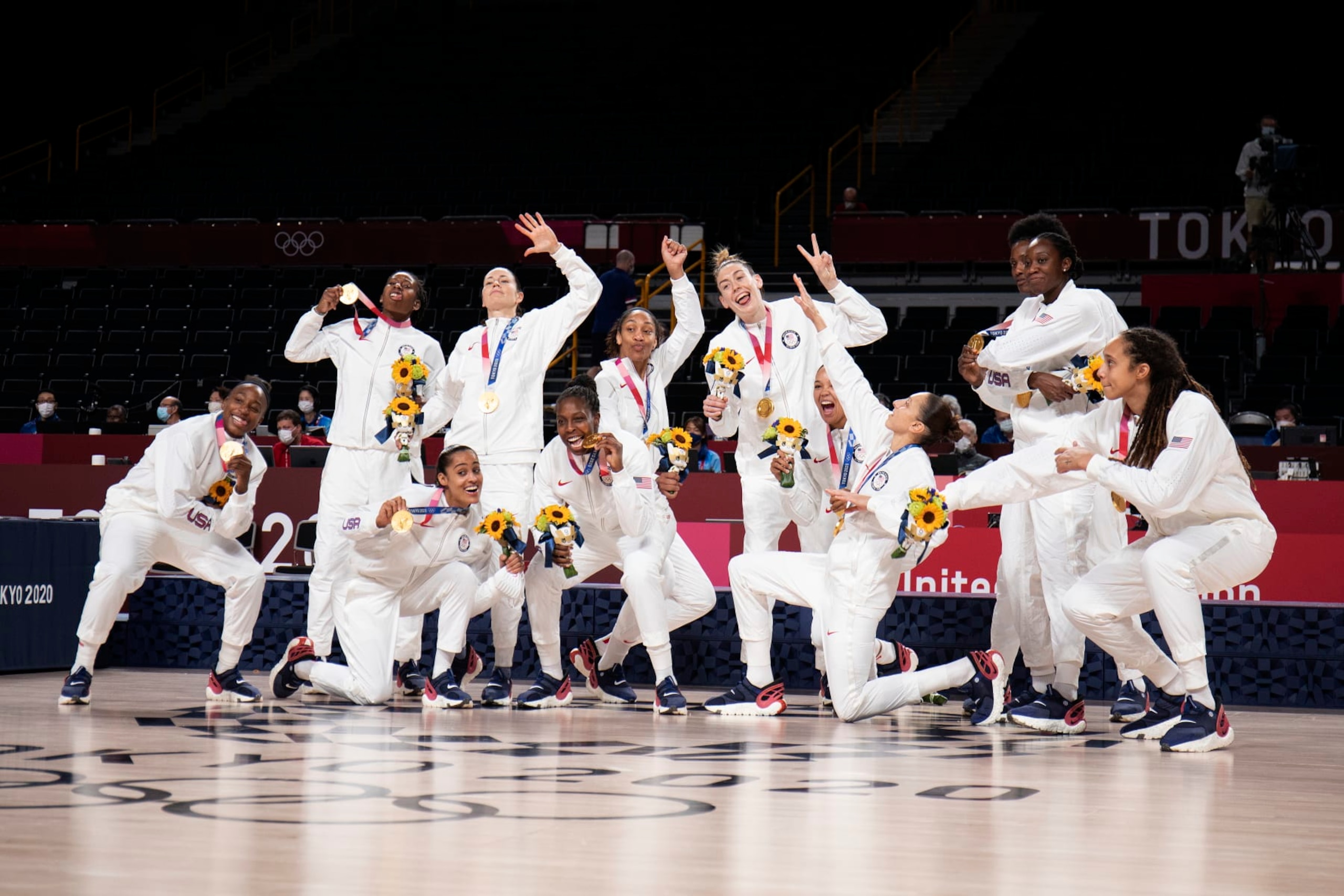 TOKYO, JAPAN August 8: The United States Women"u2019s basketball team in victory pose after the gold medal presentation after the Japan V USA basket final for women at the Saitama Super Arena during the Tokyo 2020 Summer Olympic Games on August 8, 2021 in Tokyo, Japan. (Photo by Tim Clayton/Corbis via Getty Images) TOKYO, JAPAN August 8: The United States Women"u2019s basketball team in victory pose after the gold medal presentation after the Japan V USA basket final for women at the Saitama Super Arena during the Tokyo 2020 Summer Olympic Games on August 8, 2021 in Tokyo, Japan. (Photo by Tim Clayton/Corbis via Getty Images)
