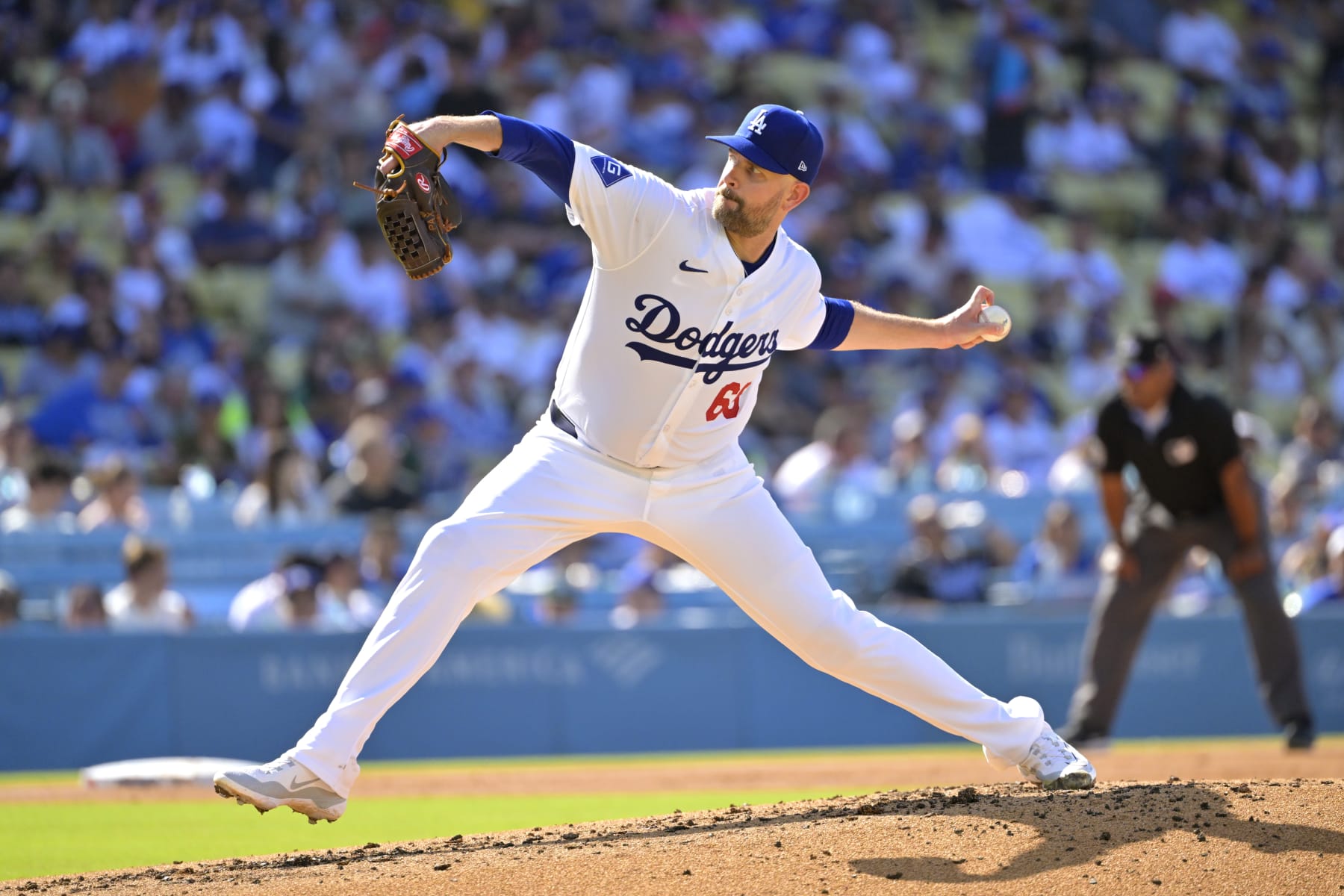 LOS ANGELES, CALIFORNIA - JULY 21: James Paxton #65 of the Los Angeles Dodgers pitches in the second inning against the Boston Red Sox at Dodger Stadium on July 21, 2024 in Los Angeles, California. (Photo by Jayne Kamin-Oncea/Getty Images)