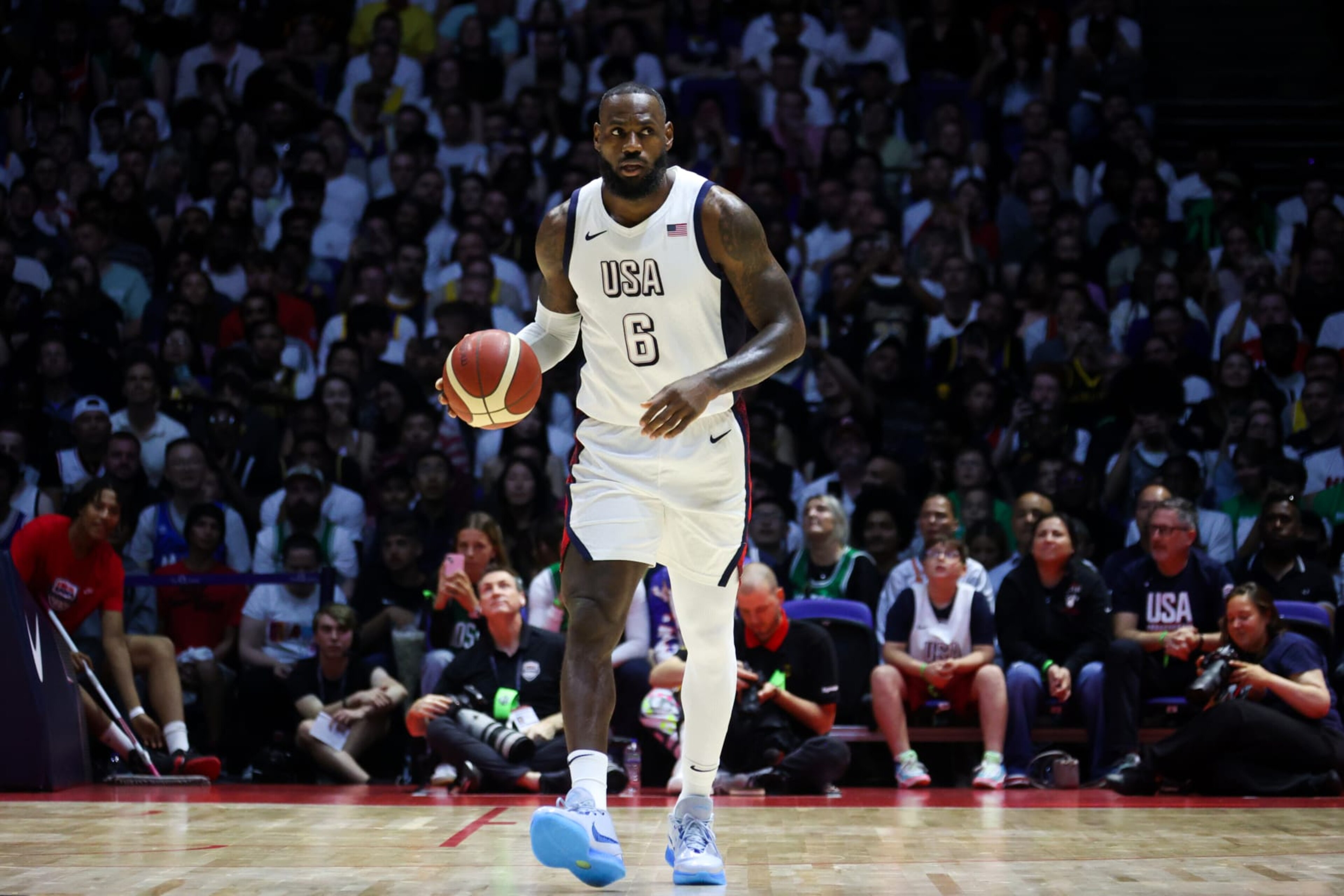 LONDON, ENGLAND - JULY 22: LeBron James #6 of Team USA dribbles the ball during the game against Team Germany as part of the 2024 USA Basketball Showcase on July 22, 2024 in London, England at O2 Arena. NOTE TO USER: User expressly acknowledges and agrees that, by downloading and/or using this photograph, user is consenting to the terms and conditions of the Getty Images License Agreement. Mandatory Copyright Notice: Copyright 2024 NBAE (Photo by Nathaniel S. Butler/NBAE via Getty Images) LONDON, ENGLAND - JULY 22: LeBron James #6 of Team USA dribbles the ball during the game against Team Germany as part of the 2024 USA Basketball Showcase on July 22, 2024 in London, England at O2 Arena. NOTE TO USER: User expressly acknowledges and agrees that, by downloading and/or using this photograph, user is consenting to the terms and conditions of the Getty Images License Agreement. Mandatory Copyright Notice: Copyright 2024 NBAE (Photo by Nathaniel S. Butler/NBAE via Getty Images)