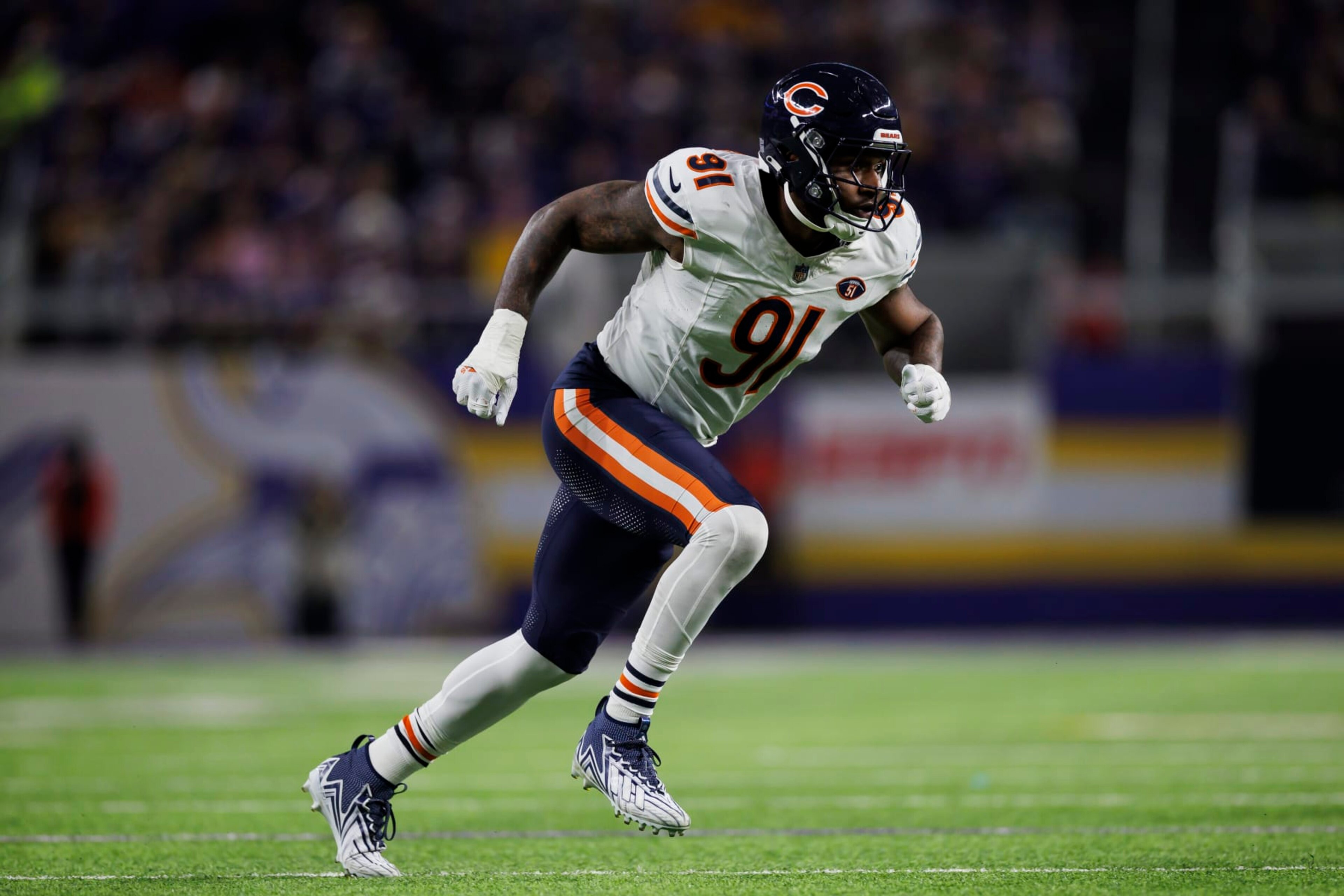 MINNEAPOLIS, MINNESOTA - NOVEMBER 27: Yannick Ngakoue #91 of the Chicago Bears runs around the edge during an NFL football game against the Minnesota Vikings at U.S. Bank Stadium on November 27, 2023 in Minneapolis, Minnesota. (Photo by Ryan Kang/Getty Images)