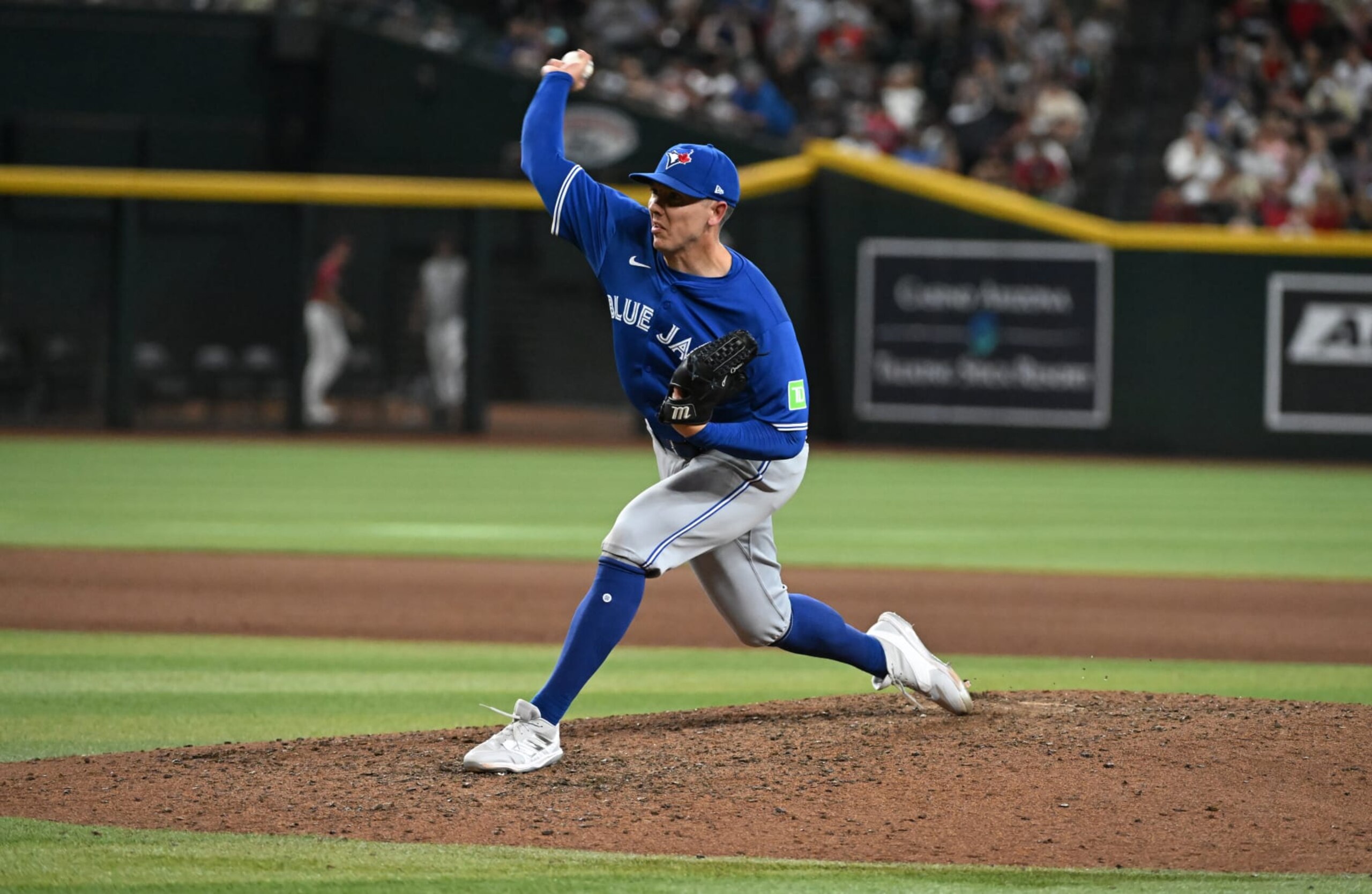 PHOENIX, ARIZONA - JULY 14: Chad Green #57 of the Toronto Blue Jays delivers a pitch against the Arizona Diamondbacks at Chase Field on July 14, 2024 in Phoenix, Arizona. (Photo by Norm Hall/Getty Images) PHOENIX, ARIZONA - JULY 14: Chad Green #57 of the Toronto Blue Jays delivers a pitch against the Arizona Diamondbacks at Chase Field on July 14, 2024 in Phoenix, Arizona. (Photo by Norm Hall/Getty Images)