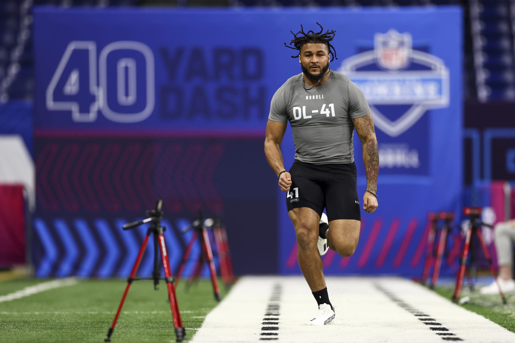 INDIANAPOLIS, INDIANA - FEBRUARY 29: Marshawn Kneeland #DL41 of Western Michigan runs the the 40-yard dash during the NFL Combine at Lucas Oil Stadium on February 29, 2024 in Indianapolis, Indiana. (Photo by Kevin Sabitus/Getty Images)