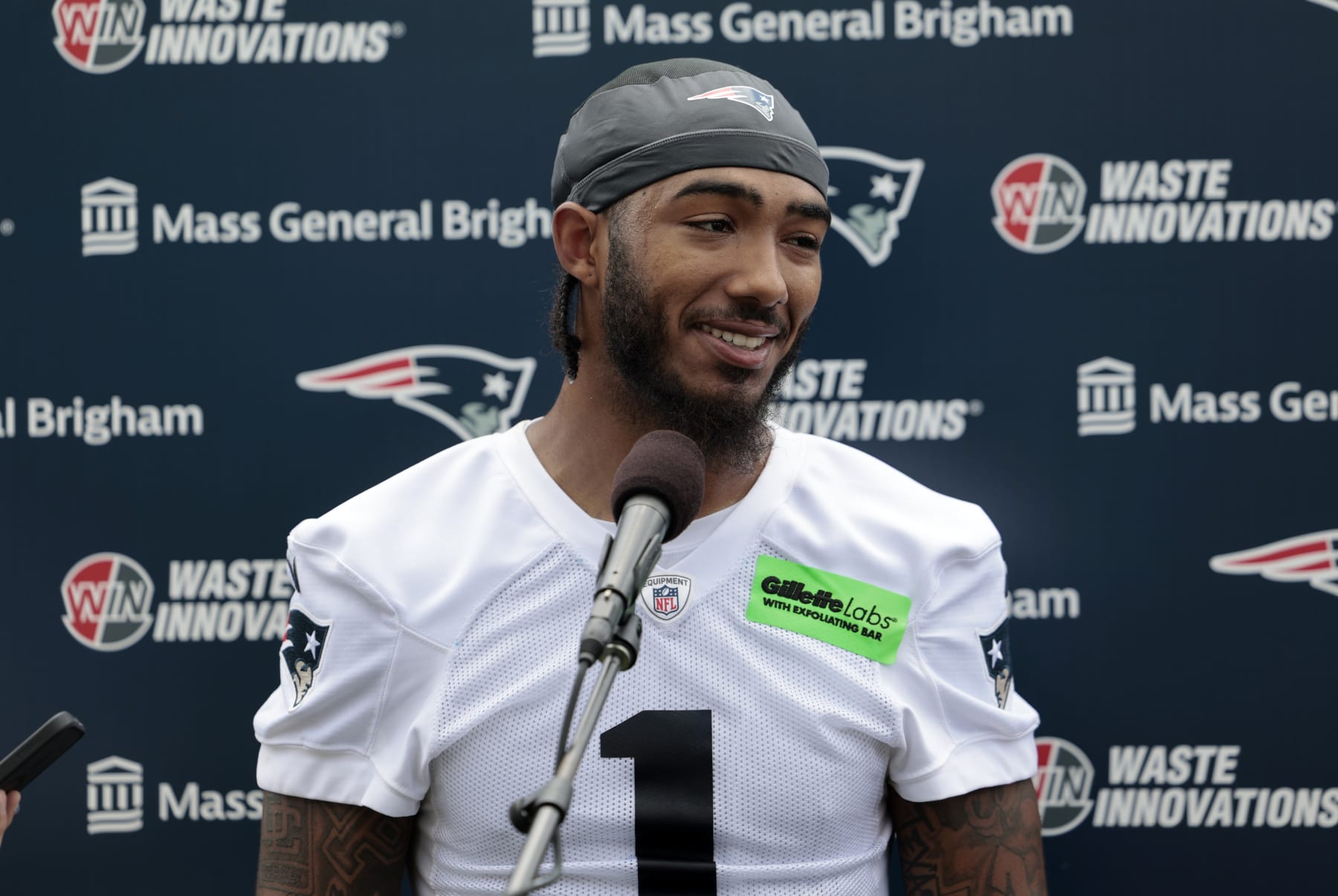 FOXBOROUGH, MA - JUNE 12: New England Patriots wide receiver Ja'Lynn Polk (1) speaks to the press during New England Patriots Minicamp on June 12, 2024, at The Patriots practice facility at Gillette Stadium in Foxborough, Massachusetts. (Photo by Fred Kfoury III/Icon Sportswire via Getty Images)