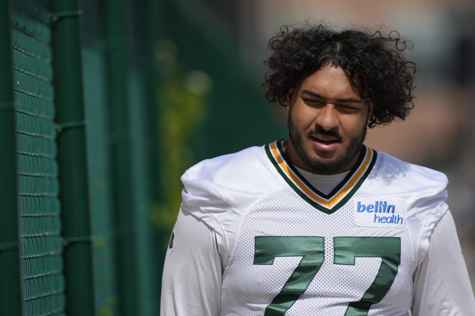 GREEN BAY, WISCONSIN - JUNE 11: Jordan Morgan #77 of the Green Bay Packers participates in drills during the Green Bay Packers Minicamp at Ray Nitschke Field on June 11, 2024 in Green Bay, Wisconsin. (Photo by Patrick McDermott/Getty Images)