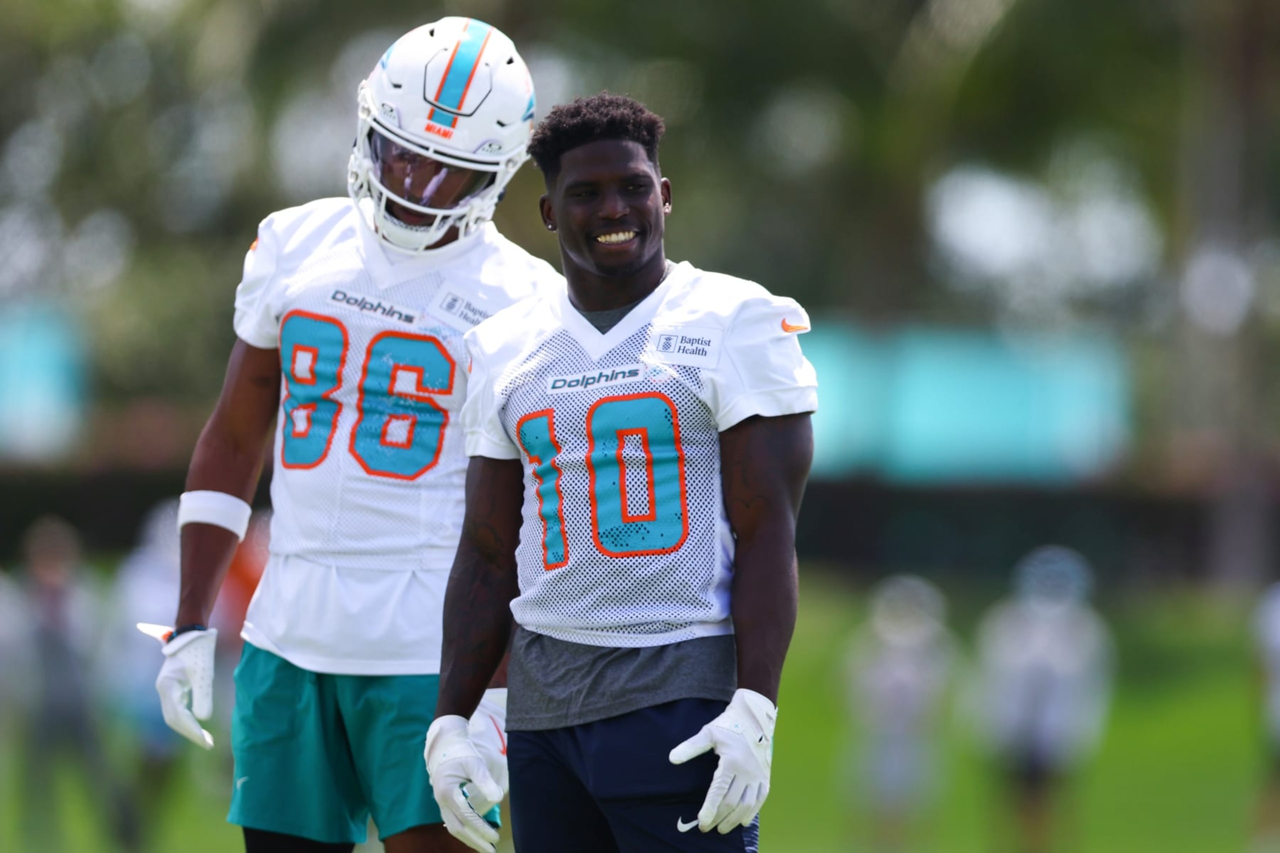 MIAMI GARDENS, FLORIDA - JUNE 04: Tyreek Hill #10 of the Miami Dolphins looks on during Miami Dolphins Mandatory Minicamp  on June 04, 2024 in Miami Gardens, Florida. (Photo by Megan Briggs/Getty Images)