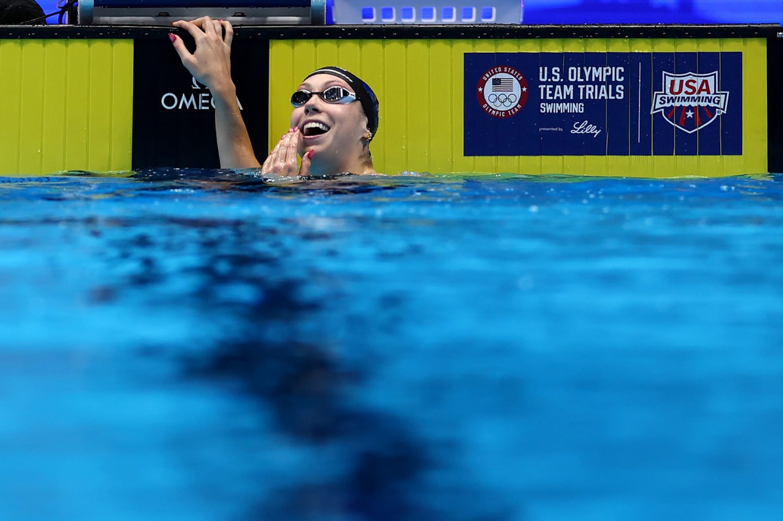 INDIANAPOLIS, INDIANA - JUNE 15: Gretchen Walsh of the United States reacts after finishing a preliminary heat for the Women's 100m butterfly on Day One of the 2024 U.S. Olympic Team Swimming Trials at Lucas Oil Stadium on June 15, 2024 in Indianapolis, Indiana. (Photo by Maddie Meyer/Getty Images) INDIANAPOLIS, INDIANA - JUNE 15: Gretchen Walsh of the United States reacts after finishing a preliminary heat for the Women's 100m butterfly on Day One of the 2024 U.S. Olympic Team Swimming Trials at Lucas Oil Stadium on June 15, 2024 in Indianapolis, Indiana. (Photo by Maddie Meyer/Getty Images)