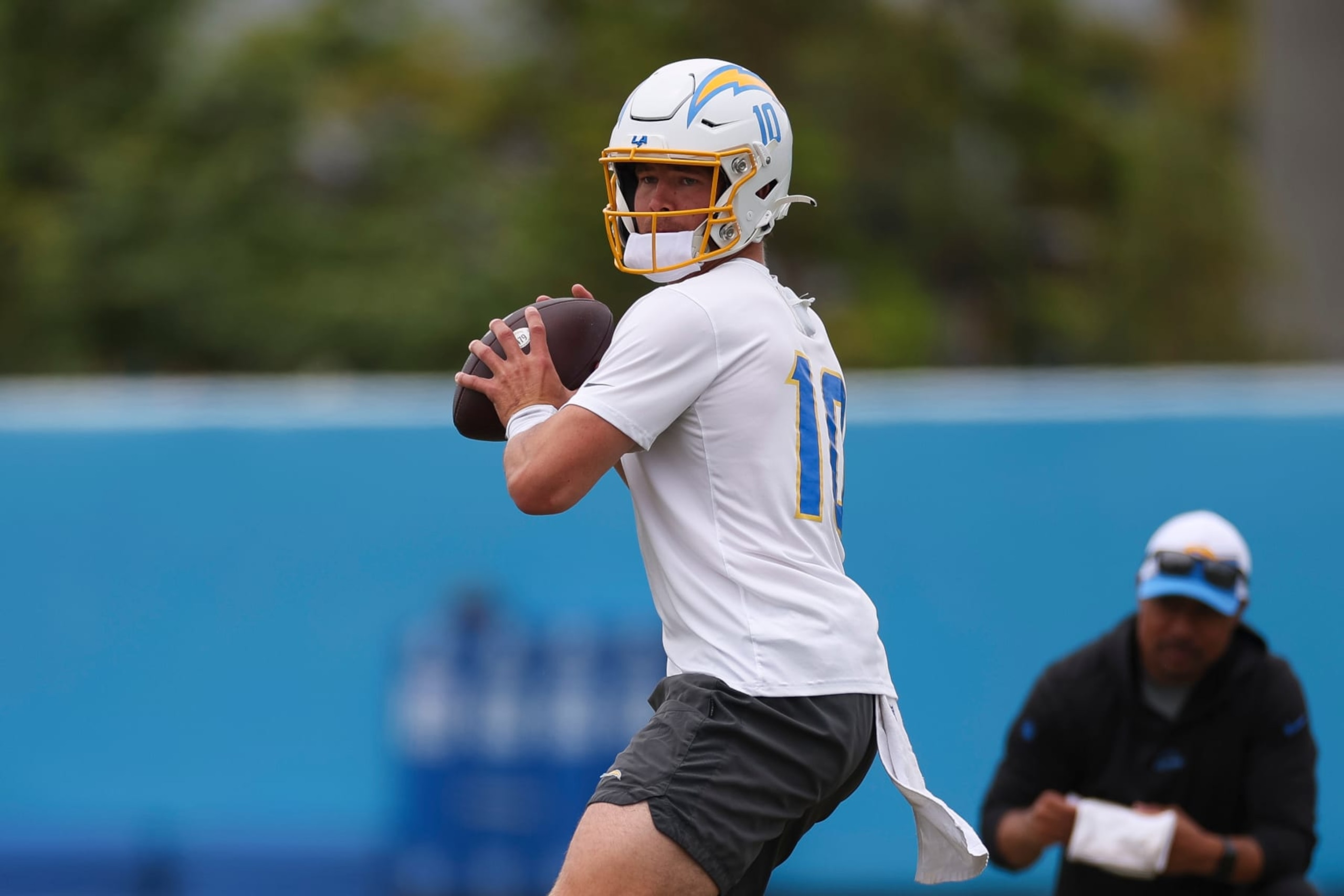 COSTA MESA, CA - JUNE 04: Los Angeles Chargers quarterback Justin Herbert (10) takes part in a drill during the team's OTA practice on June 04, 2024, at the Hoag Performance Center in Costa Mesa, CA. (Photo by Brandon Sloter/Icon Sportswire via Getty Images) COSTA MESA, CA - JUNE 04: Los Angeles Chargers quarterback Justin Herbert (10) takes part in a drill during the team's OTA practice on June 04, 2024, at the Hoag Performance Center in Costa Mesa, CA. (Photo by Brandon Sloter/Icon Sportswire via Getty Images)