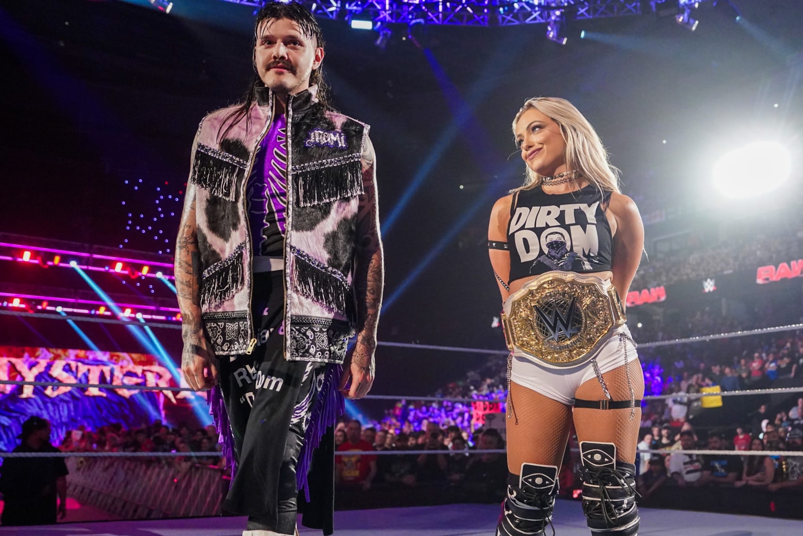 OTTAWA, CANADA - JULY 8: Dominik Mysterio and the Women's World Champion, Liv Morgan enter the ring during Monday Night RAW at Canadian Tire Centre on July 8, 2024 in Ottawa, Ontario. (Photo by WWE/Getty Images) OTTAWA, CANADA - JULY 8: Dominik Mysterio and the Women's World Champion, Liv Morgan enter the ring during Monday Night RAW at Canadian Tire Centre on July 8, 2024 in Ottawa, Ontario. (Photo by WWE/Getty Images)