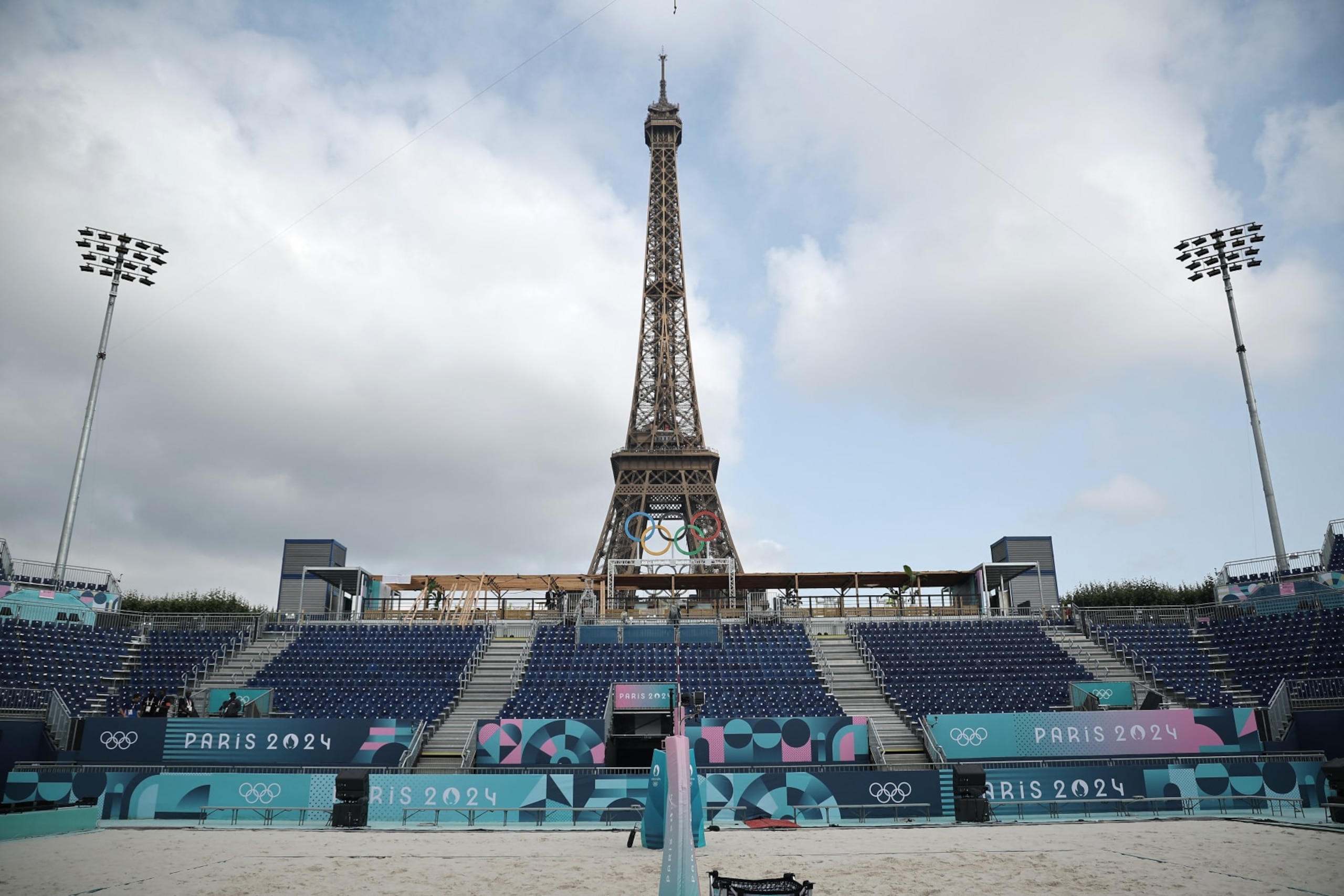 This photograph taken on Champ-de-Mars in Paris, France, on 24 July 2024, shows the "Stade Tour Eiffel" ahead of the Paris 2024 Olympic and Paralympic games. The "Stade Tour Eiffel" will host beach volleyball and blind football games during the 2024 Paris Olympics. (Photo by Christophe PETIT TESSON / POOL / AFP) (Photo by CHRISTOPHE PETIT TESSON/POOL/AFP via Getty Images)