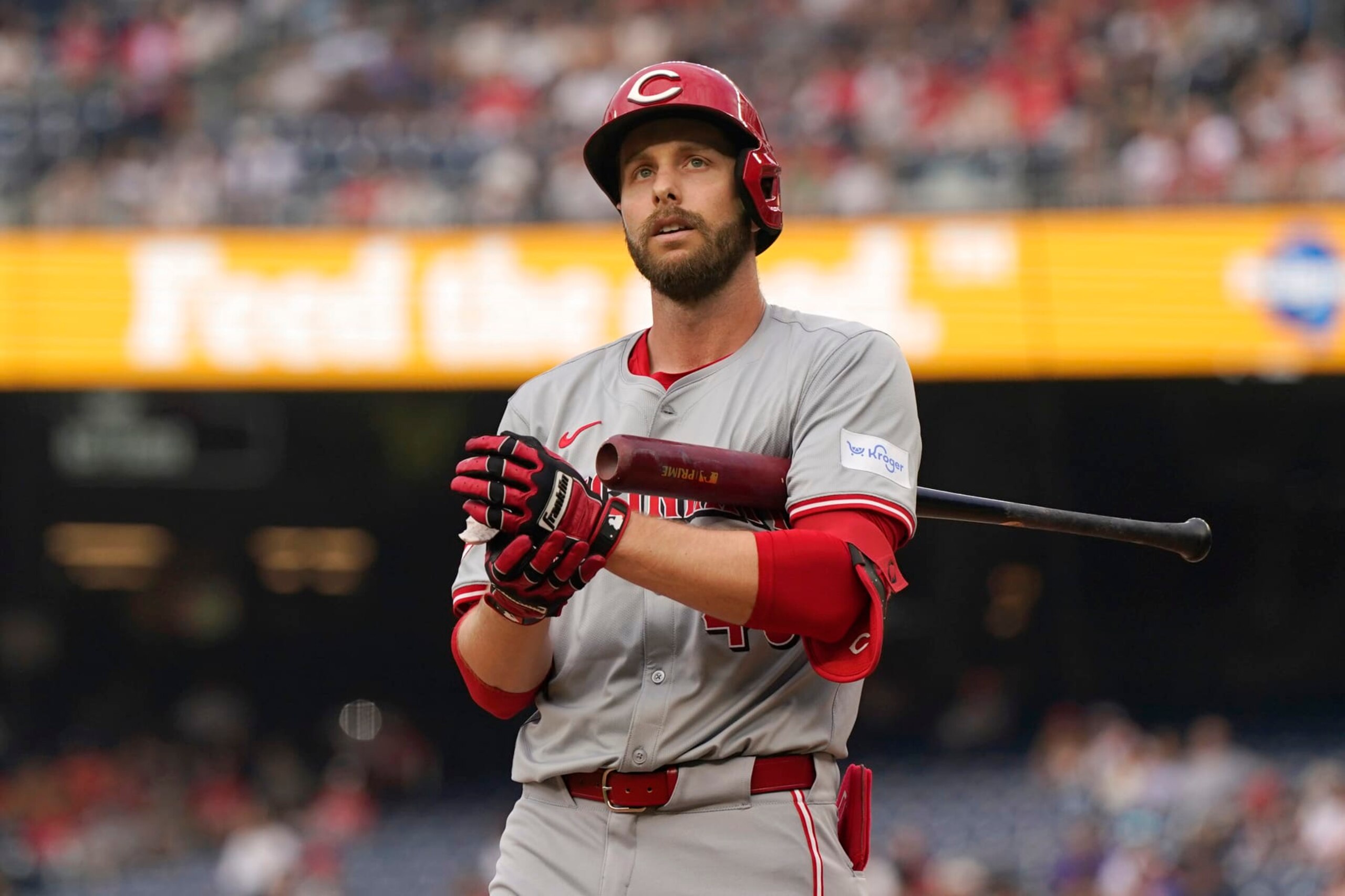 WASHINGTON, DC - JULY 20: Austin Slater #48 of the Cincinnati Reds adjusts his batting gloves while at bat against the Washington Nationals during the first inning at Nationals Park on July 20, 2024 in Washington, DC. (Photo by Jess Rapfogel/Getty Images)