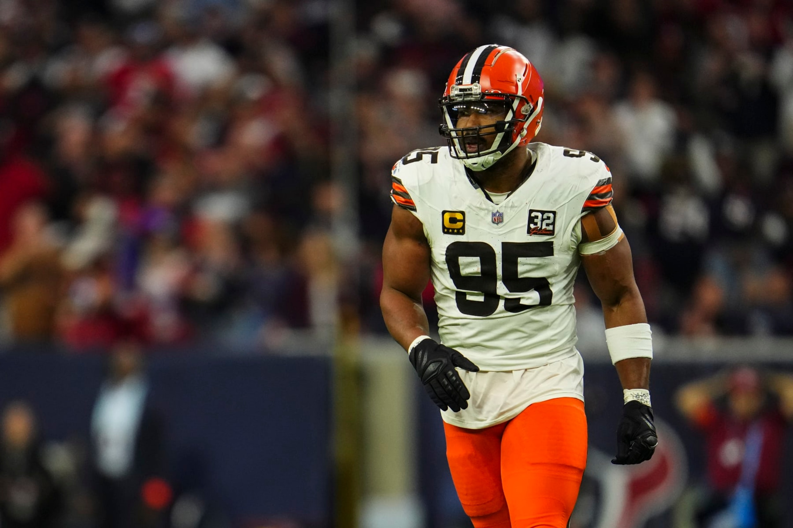 HOUSTON, TX - JANUARY 13: Myles Garrett #95 of the Cleveland Browns looks on from the field during an NFL wild-card playoff football game against the Houston Texans at NRG Stadium on January 13, 2024 in Houston, Texas. (Photo by Cooper Neill/Getty Images)