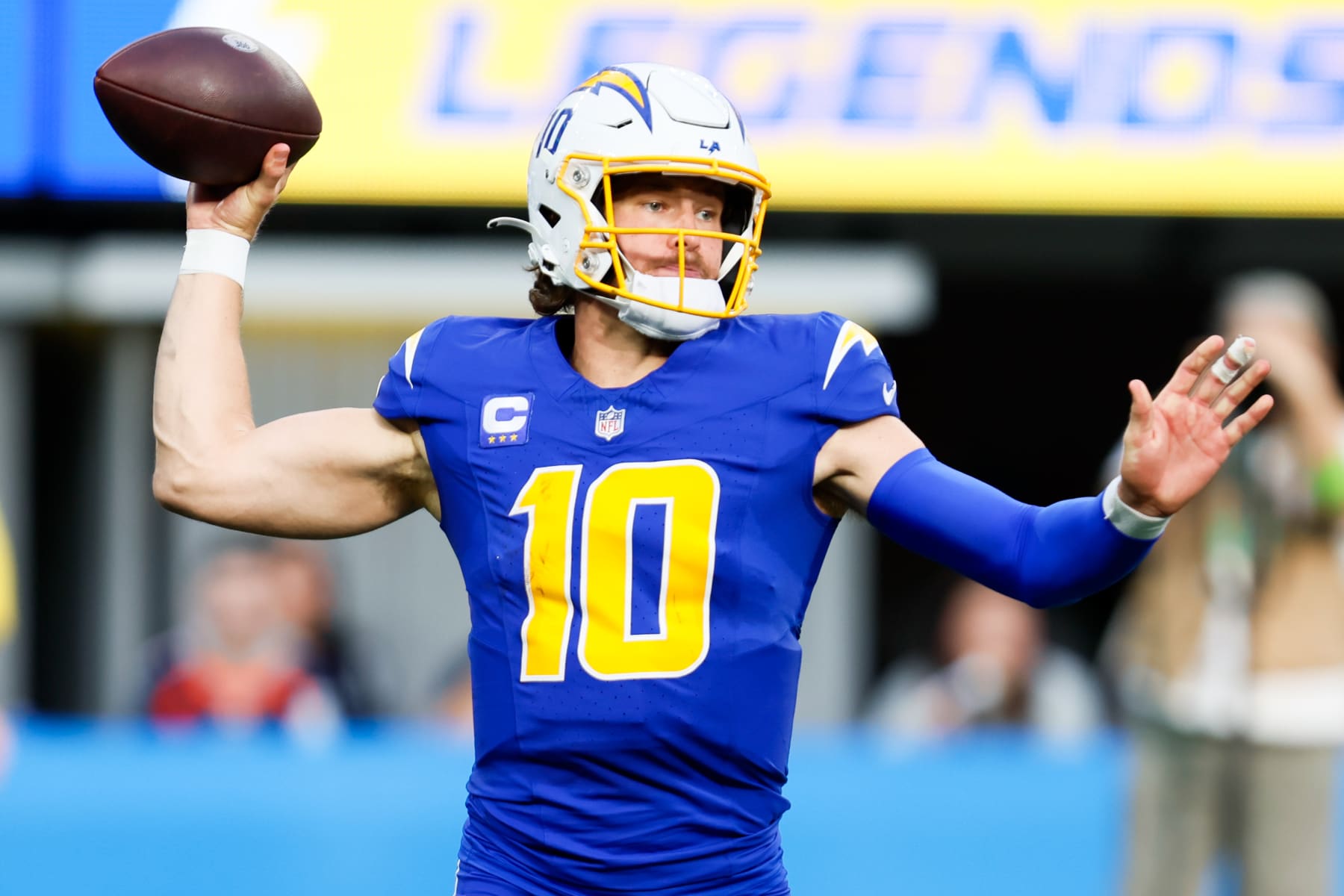Inglewood, CA - December 10: Los Angeles Chargers quarterback Justin Herbert (10) throws a pass against the Denver Broncos during the first half at SoFi Stadium in Inglewood Sunday, Dec. 10, 2023. (Allen J. Schaben / Los Angeles Times via Getty Images)
