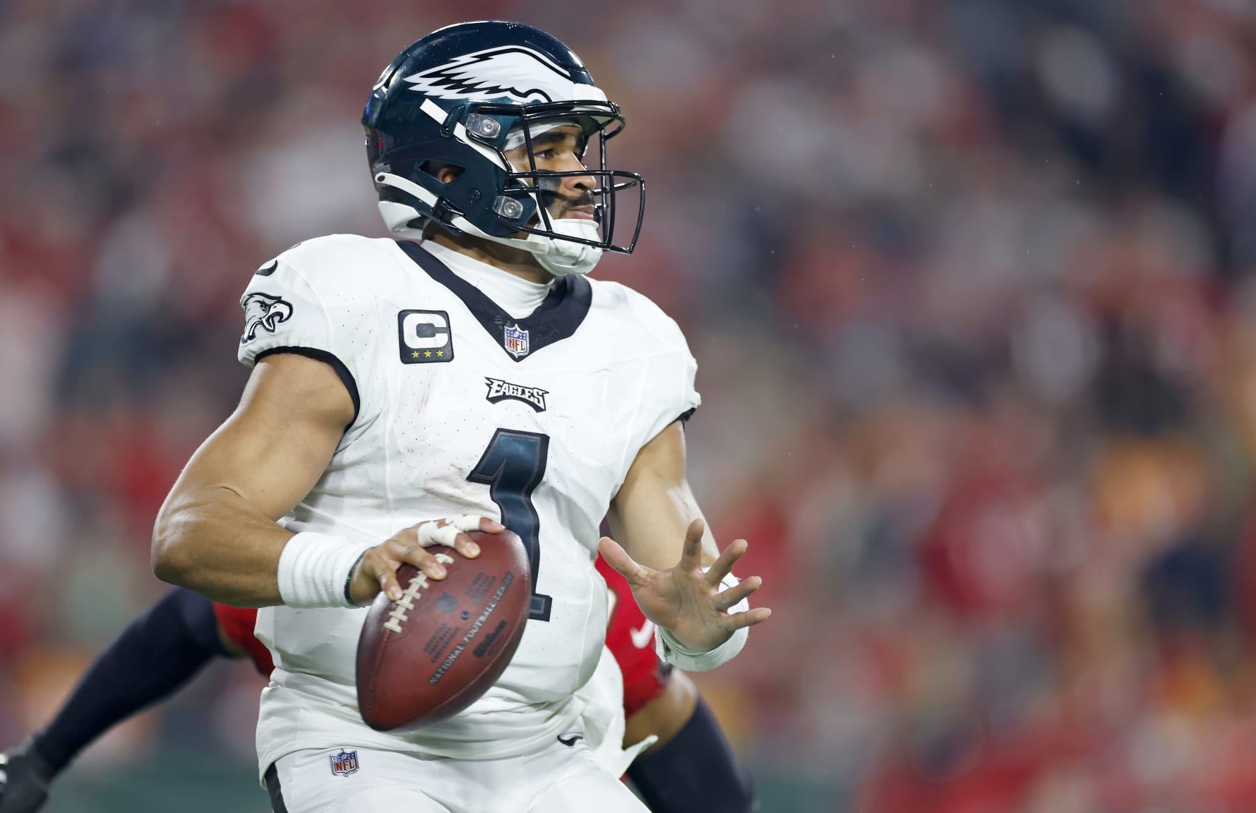 TAMPA, FLORIDA - JANUARY 15: Jalen Hurts #1 of the Philadelphia Eagles plays during the NFC Wild Card game against the Tampa Bay Buccaneers at Raymond James Stadium on January 15, 2024 in Tampa, Florida. (Photo by Mike Ehrmann/Getty Images)