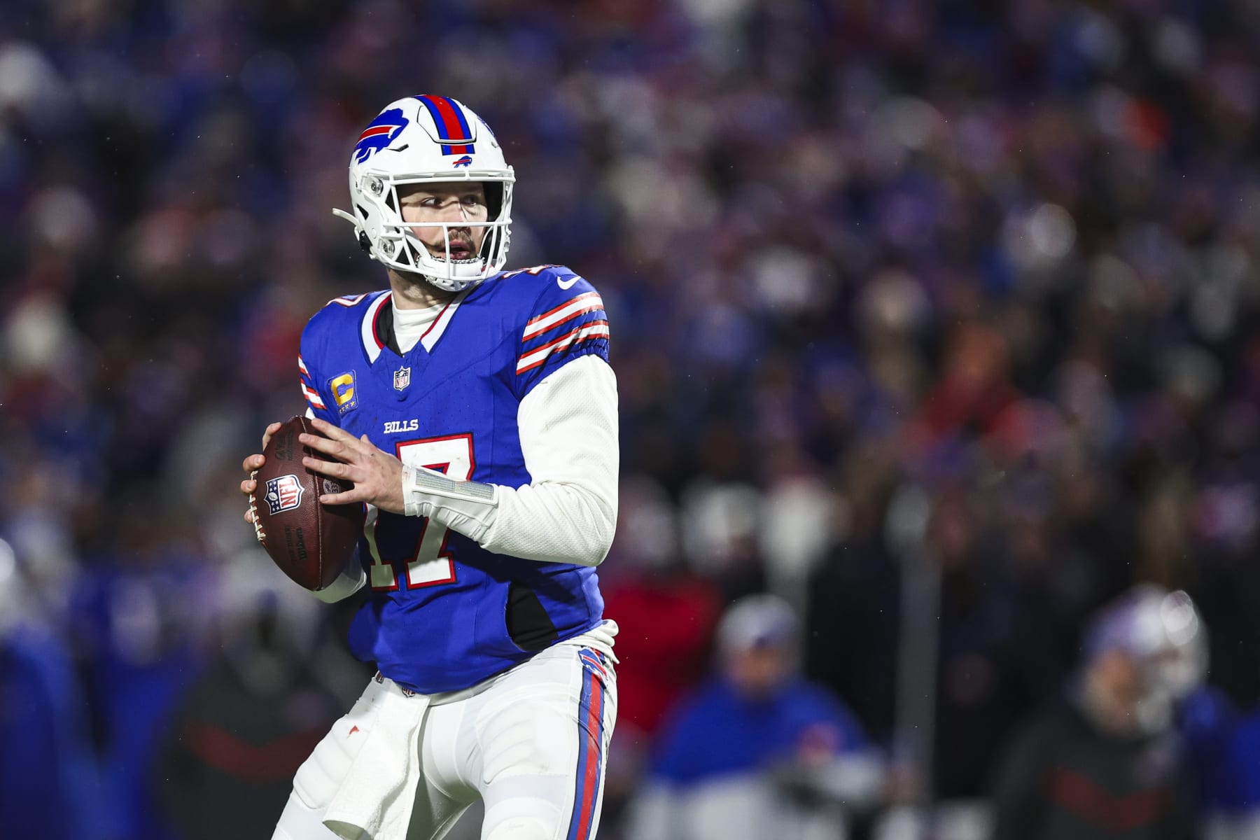 ORCHARD PARK, NY - JANUARY 21: Josh Allen #17 of the Buffalo Bills drops back to pass during an NFL divisional round playoff football game against the Kansas City Chiefs at Highmark Stadium on January 21, 2024 in Orchard Park, New York. (Photo by Perry Knotts/Getty Images)