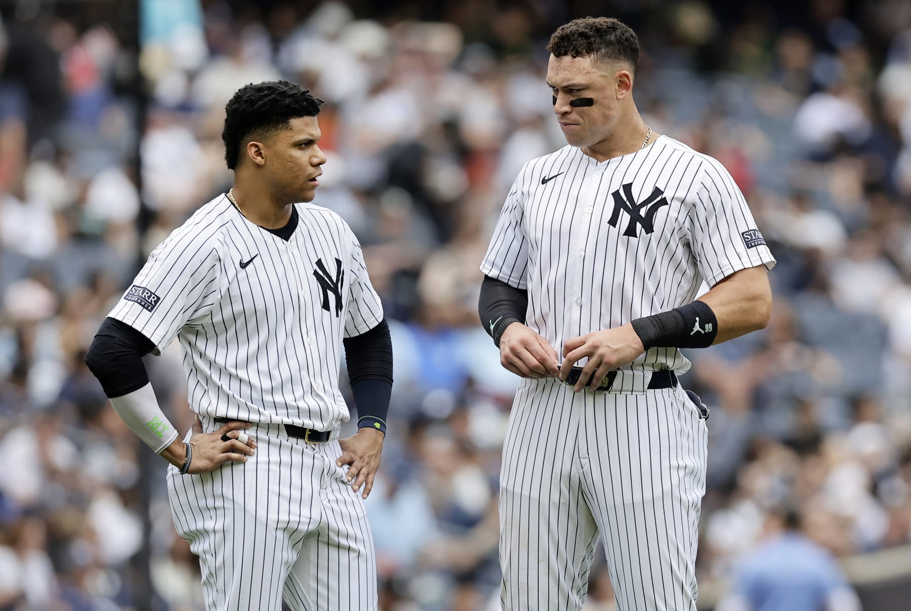 NEW YORK, NEW YORK - MAY 23:  Juan Soto #22 and Aaron Judge #99 of the New York Yankees talk on the field after both were stranded on base after the fifth inning against the Seattle Mariners at Yankee Stadium on May 23, 2024 in New York City. (Photo by Jim McIsaac/Getty Images)