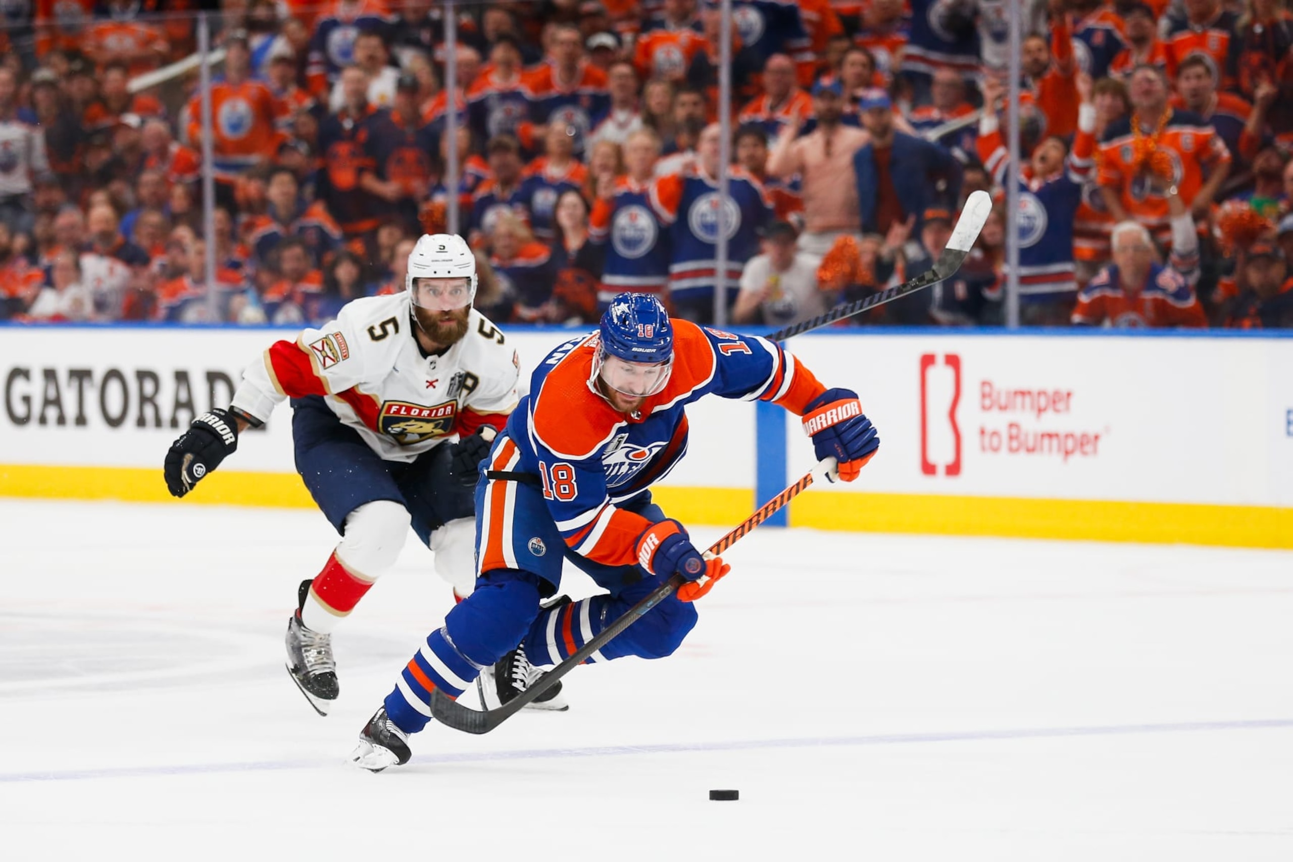 EDMONTON, ALBERTA - JUNE 21: Zach Hyman #18 of the Edmonton Oilers skates past Aaron Ekblad #5 of the Florida Panthers during the second period of Game Six of the 2024 Stanley Cup Final at Rogers Place on June 21, 2024 in Edmonton, Alberta.  (Photo by Codie McLachlan/Getty Images)