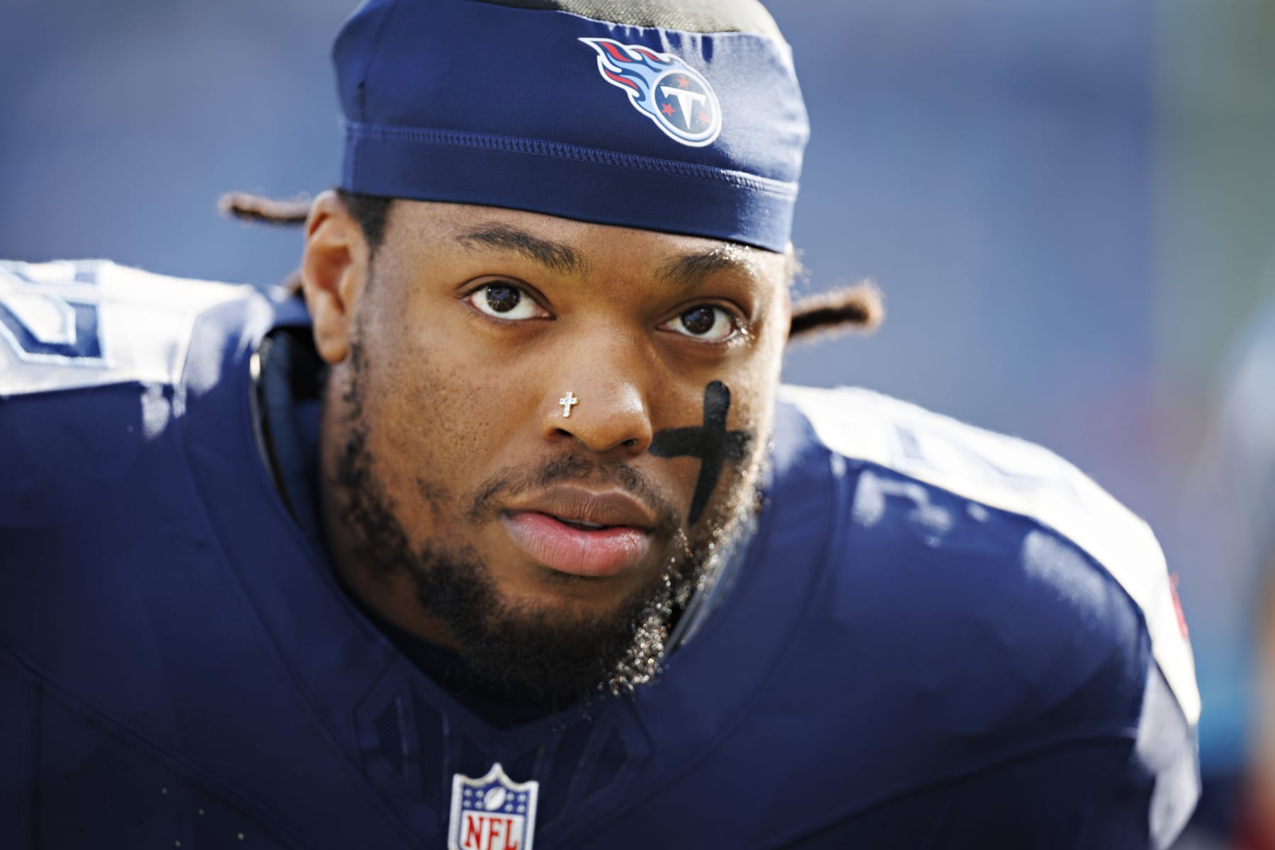 NASHVILLE TENNESSEE - JANUARY 07: Derrick Henry #22 of the Tennessee Titans warms up before the game against the Jacksonville Jaguars in Nashville, Tennessee at Nissan Stadium on January 7, 2024 in Houston, Texas. The Titans defeated the Jaguars 28-20.  (Photo by Wesley Hitt/Getty Images)