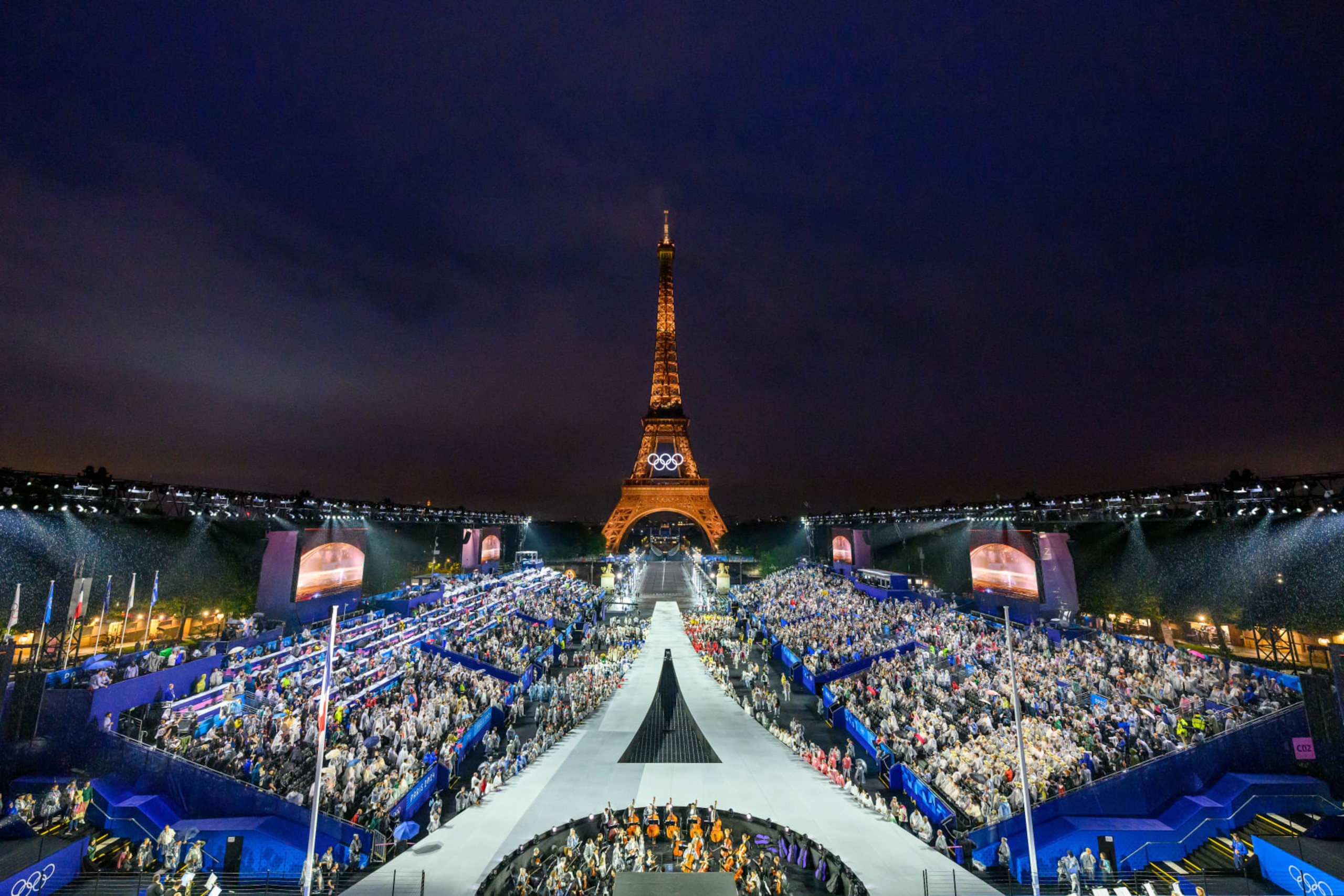 PARIS, FRANCE - JULY 26: Overview of the Trocadero venue while the delegations arrive, during the opening ceremony of the Paris 2024 Olympic Games, as the Eiffel Tower is seen in the background, on July 26, 2024 on July 26, 2024 in Paris, France. (Photo by François-Xavier Marit - Pool/Getty Images) PARIS, FRANCE - JULY 26: Overview of the Trocadero venue while the delegations arrive, during the opening ceremony of the Paris 2024 Olympic Games, as the Eiffel Tower is seen in the background, on July 26, 2024 on July 26, 2024 in Paris, France. (Photo by François-Xavier Marit - Pool/Getty Images)