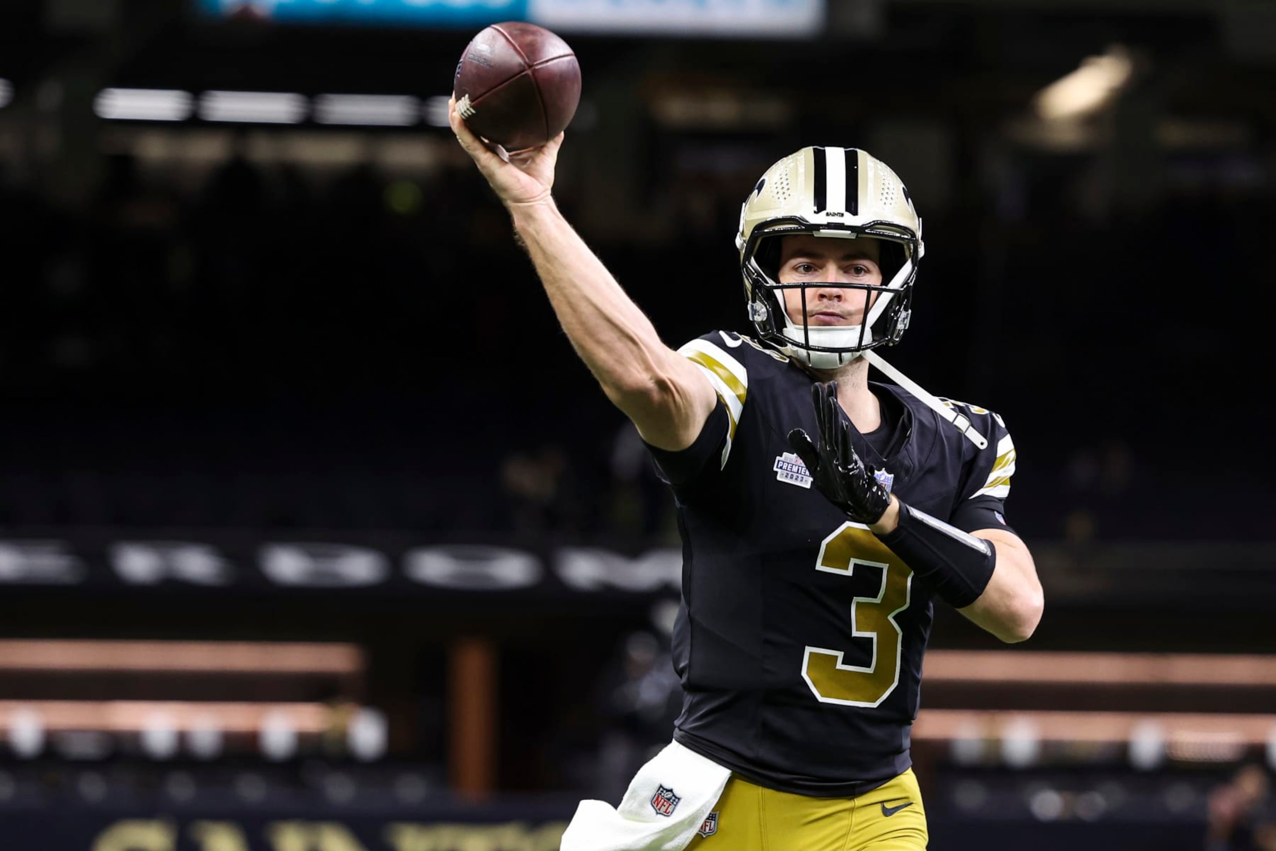 NEW ORLEANS, LA - DECEMBER 10: Jake Haener #3 of the New Orleans Saints warms up prior to an NFL football game against the Carolina Panthers at Caesars Superdome on December 10, 2023 in New Orleans, LA. (Photo by Perry Knotts/Getty Images)