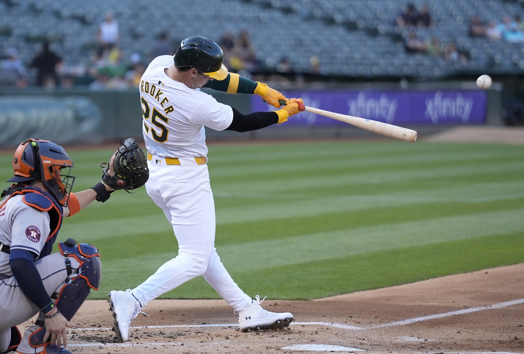 OAKLAND, CALIFORNIA - JULY 23: Brent Rooker #25 of the Oakland Athletics hits a two-run home run against the Houston Astros in the bottom of the first inning on July 23, 2024 at the Oakland Coliseum in Oakland, California. (Photo by Thearon W. Henderson/Getty Images)