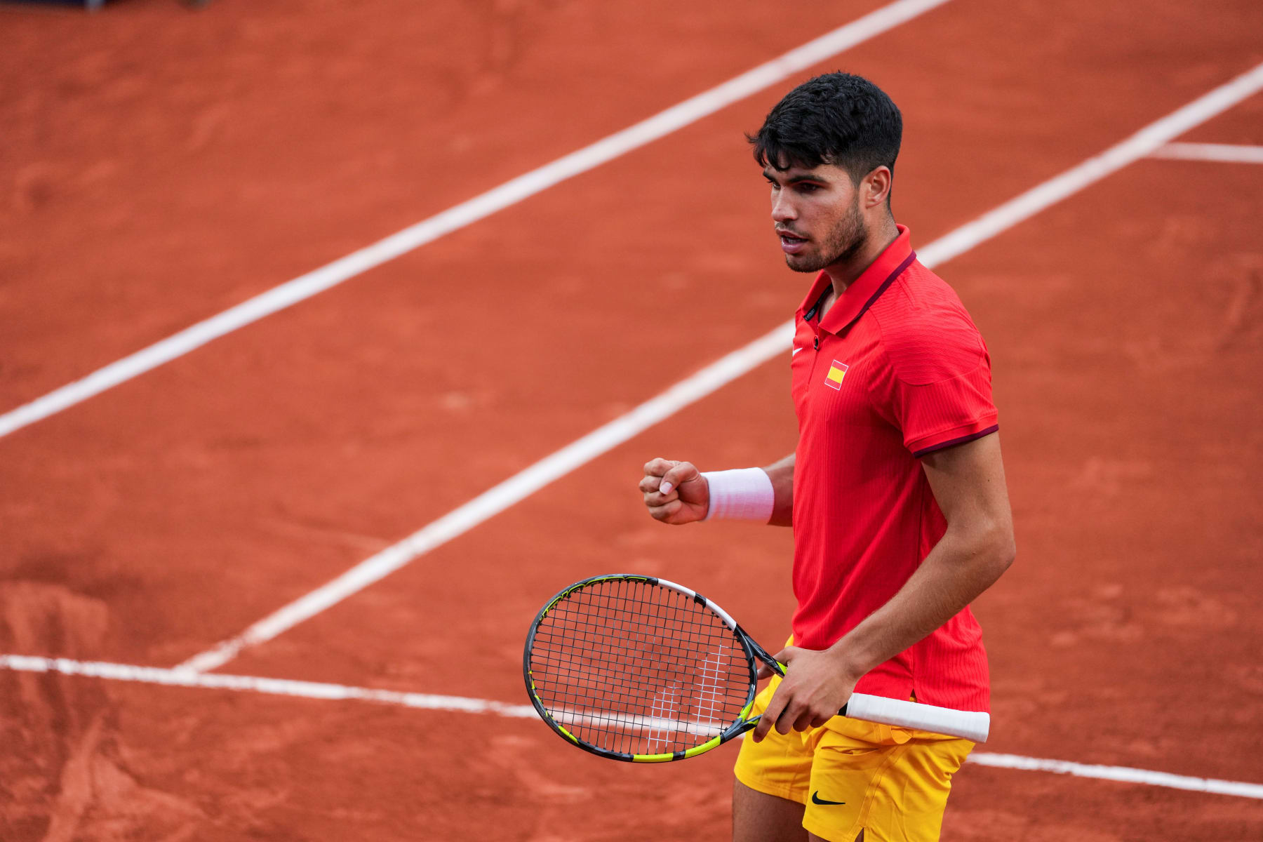 SPAIN - JULY 27: Carlos Alcaraz (ESP) gestures against Hady Habib (LBN) during men's singles first round tennis match on Court Suzanne-Lenglen at the Roland-Garros Stadium during the Paris 2024 Olympics Games on July 27, 2024 in Paris, France. (Photo By Alvaro Diaz/Europa Press via Getty Images)