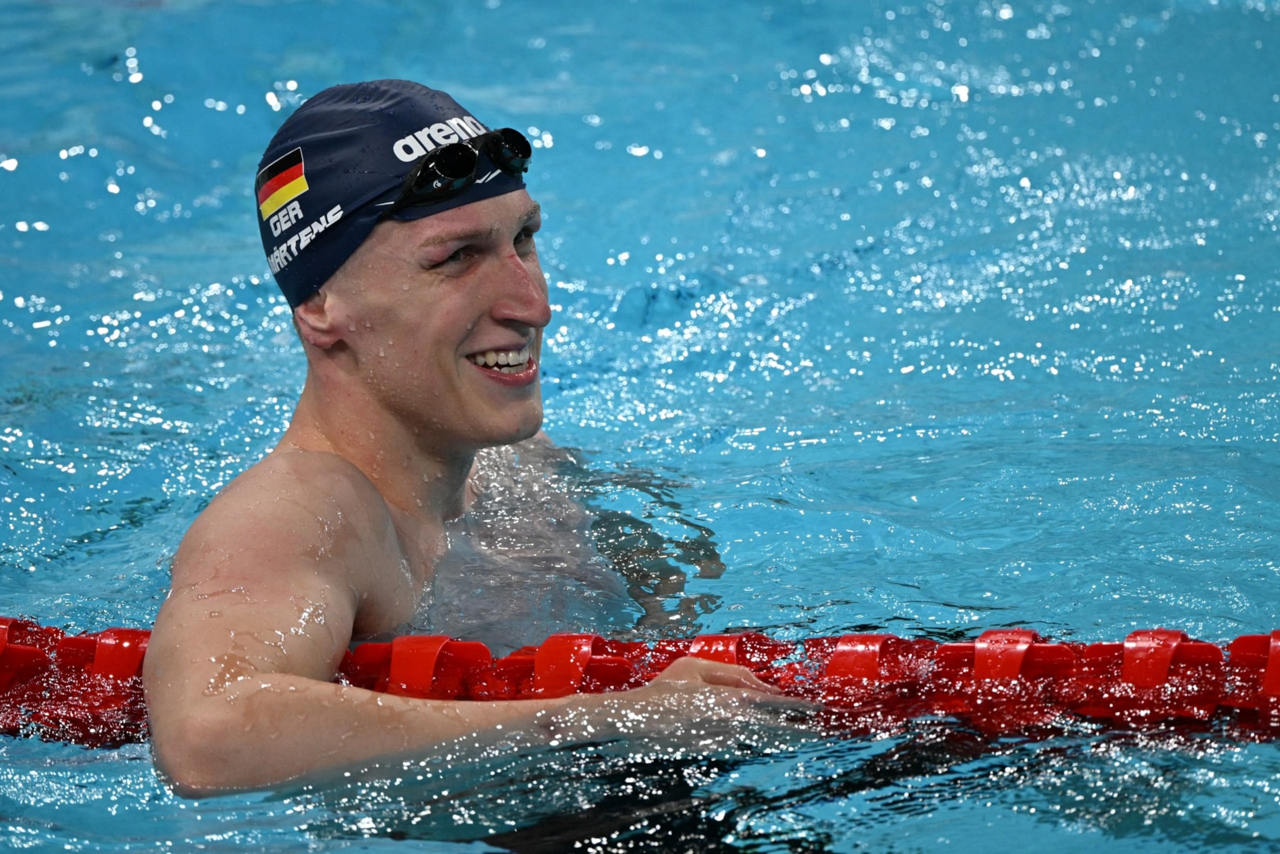 Germany's Lukas Martens reacts after winning the final of the men's 400m freestyle swimming event at the Paris La Defense Arena in Nanterre, west of Paris, on July 27, 2024. (Photo by Oli SCARFF / AFP) (Photo by OLI SCARFF/AFP via Getty Images) Germany's Lukas Martens reacts after winning the final of the men's 400m freestyle swimming event at the Paris La Defense Arena in Nanterre, west of Paris, on July 27, 2024. (Photo by Oli SCARFF / AFP) (Photo by OLI SCARFF/AFP via Getty Images)