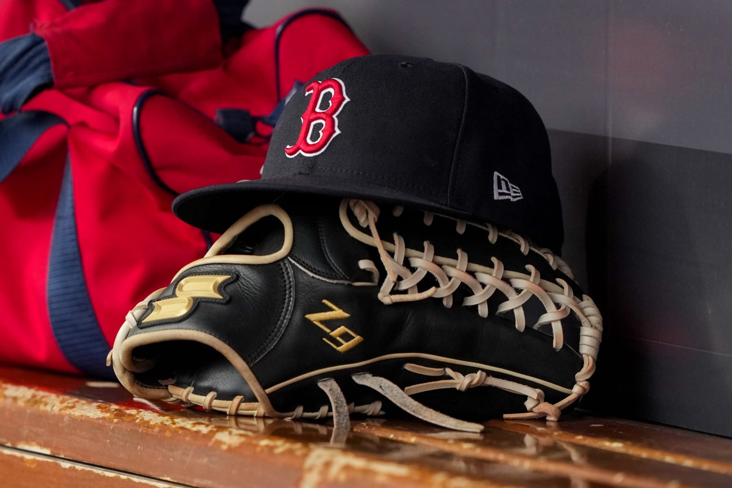 CINCINNATI, OHIO - JUNE 23: A detail view of a Boston Red Sox hat in the dugout during the game against the Cincinnati Reds at Great American Ball Park on June 23, 2024 in Cincinnati, Ohio. (Photo by Dylan Buell/Getty Images)