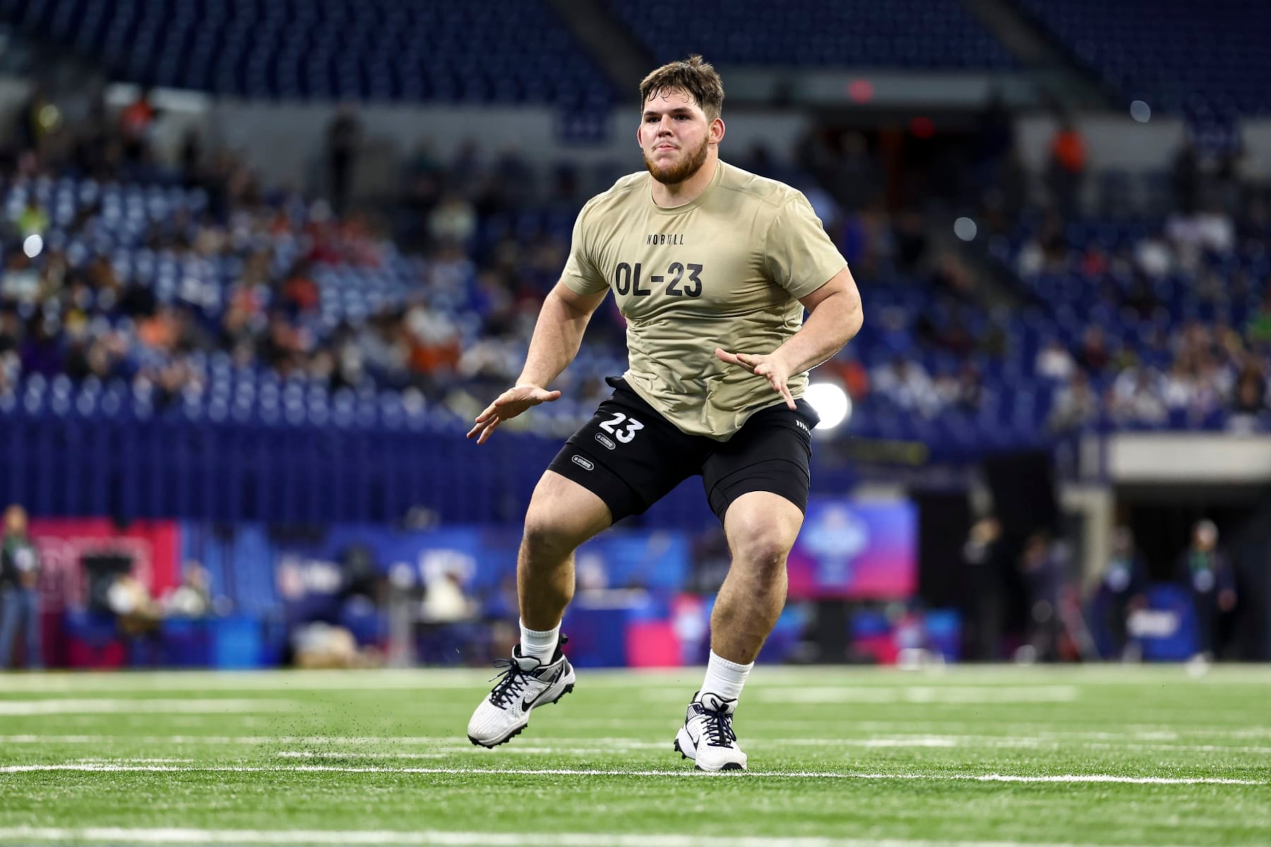 INDIANAPOLIS, INDIANA - MARCH 3: Zach Frazier #OL23 of West Virginia participates in a drill during the NFL Combine at the Lucas Oil Stadium on March 3, 2024 in Indianapolis, Indiana. (Photo by Kevin Sabitus/Getty Images) INDIANAPOLIS, INDIANA - MARCH 3: Zach Frazier #OL23 of West Virginia participates in a drill during the NFL Combine at the Lucas Oil Stadium on March 3, 2024 in Indianapolis, Indiana. (Photo by Kevin Sabitus/Getty Images)
