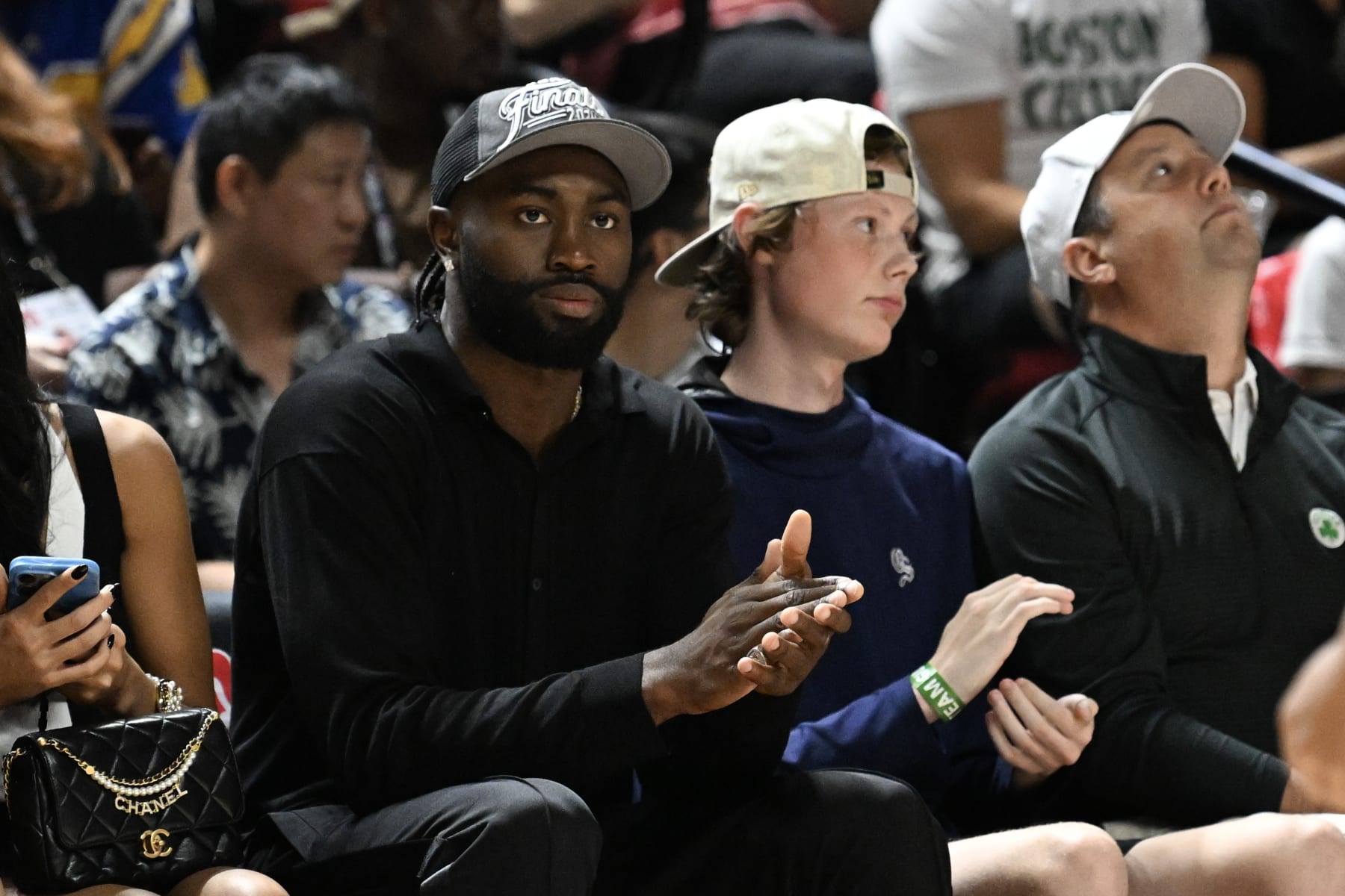 LAS VEGAS, NEVADA - JULY 15: Jaylen Brown of the Boston Celtics sits courtside during a 2024 NBA Summer League game between the Los Angeles Lakers and the Boston Celtics at the Thomas & Mack Center on July 15, 2024 in Las Vegas, Nevada. The Celtics defeated the Lakers 88-74. NOTE TO USER: User expressly acknowledges and agrees that, by downloading and or using this photograph, User is consenting to the terms and conditions of the Getty Images License Agreement. (Photo by Candice Ward/Getty Images)