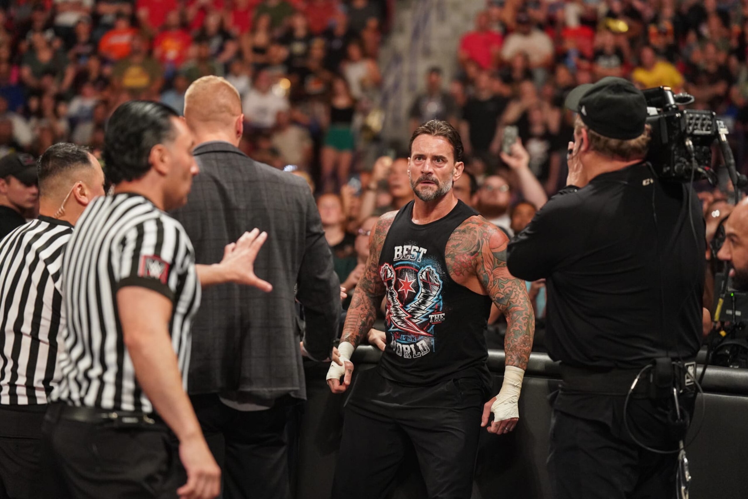 GREEN BAY, WISCONSIN - JULY 22: CM Punk looks during Monday Night RAW at Resch Center on July 22, 2024 in Green Bay, Wisconsin.  (Photo by WWE/Getty Images)
