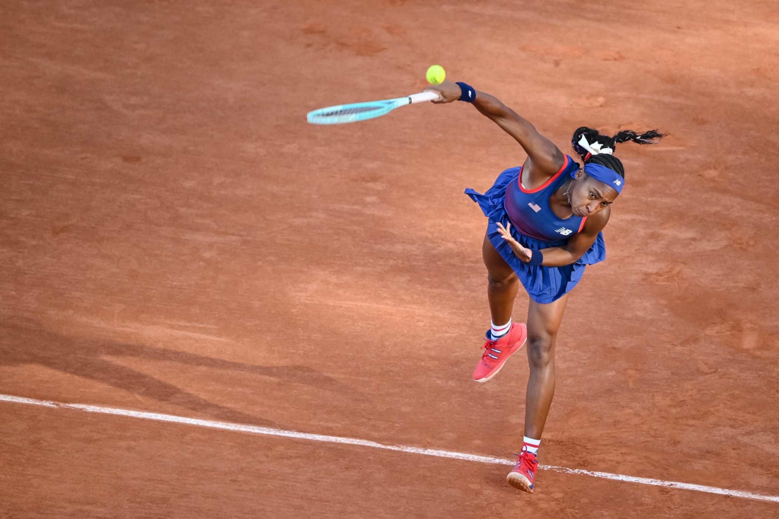 Coco Gauff of USA controls the Ball during the Women's Singles First Round match between Ajla Tomlianovic of Australia and Coco Gauff of USA on Day 2 of the Olympic Games Paris 2024 at Roland-Garros Stadium on July 28, 2024 in Paris, France. (Photo by Harry Langer/DeFodi Images via Getty Images) 