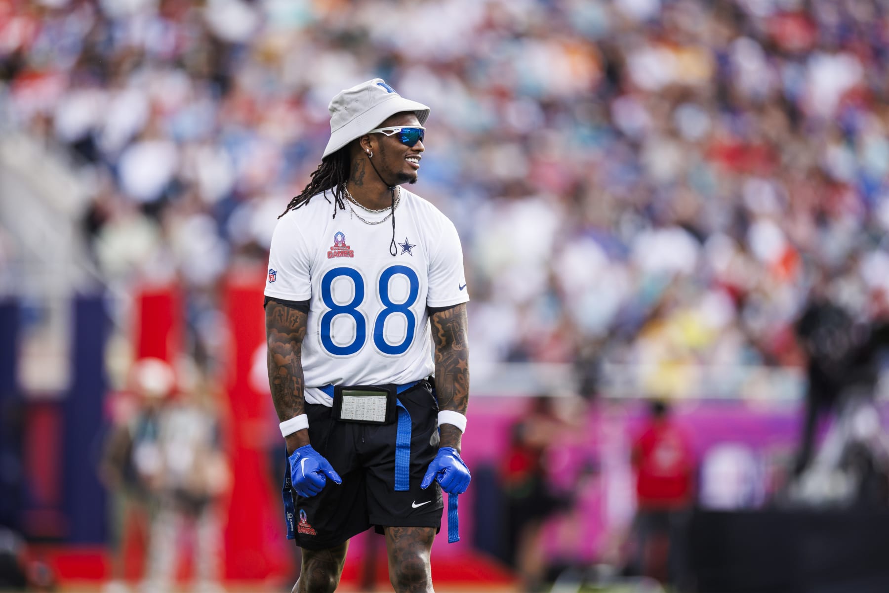 ORLANDO, FLORIDA - FEBRUARY 04: CeeDee Lamb #88 of the Dallas Cowboys and NFC looks on during the 2024 NFL Pro Bowl at Camping World Stadium on February 04, 2024 in Orlando, Florida. (Photo by James Gilbert/Getty Images)