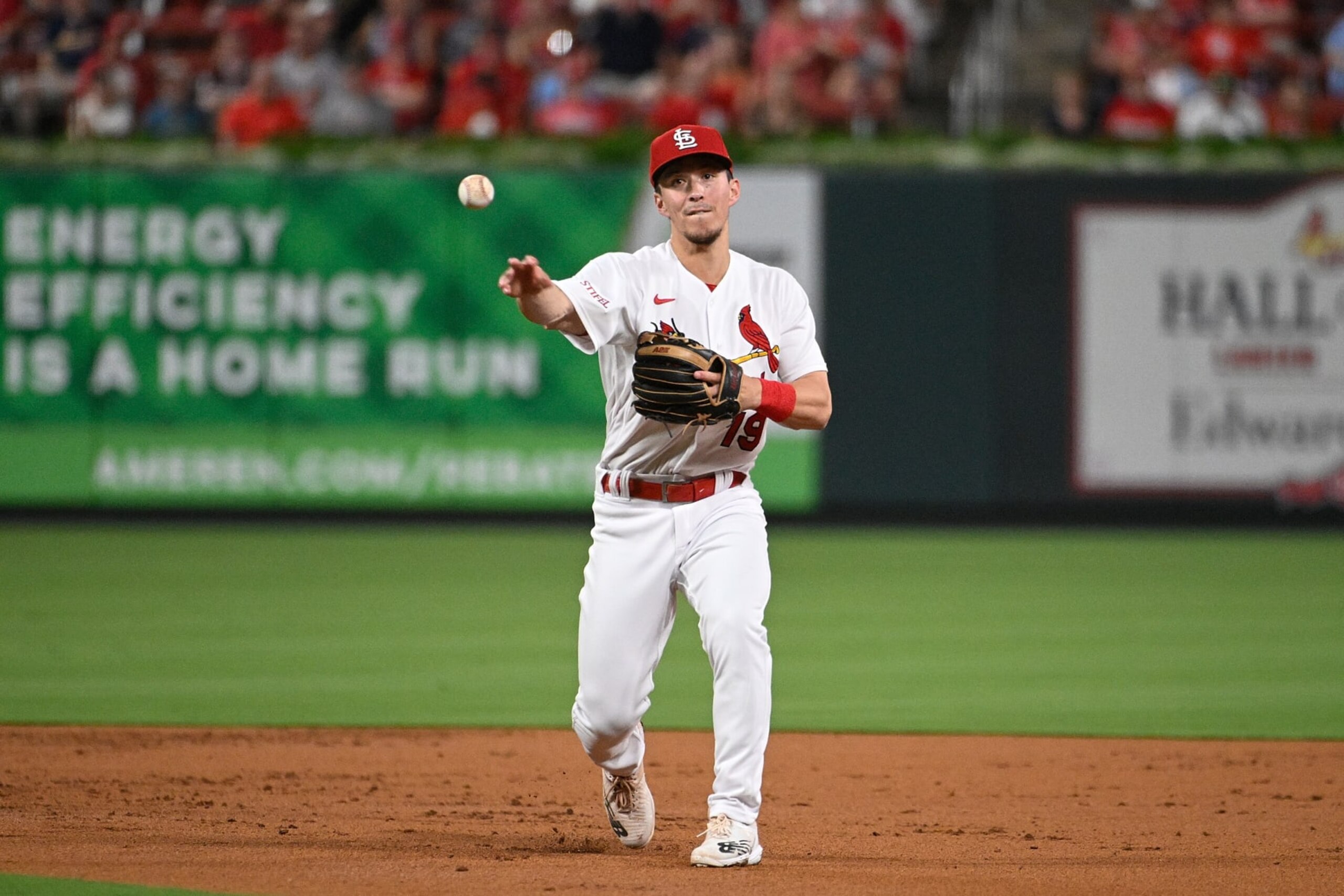 ST LOUIS, MISSOURI - SEPTEMBER 29: Tommy Edman #19 of the St. Louis Cardinals throws against the Cincinnati Reds at Busch Stadium on September 29, 2023 in St Louis, Missouri. (Photo by Joe Puetz/Getty Images)