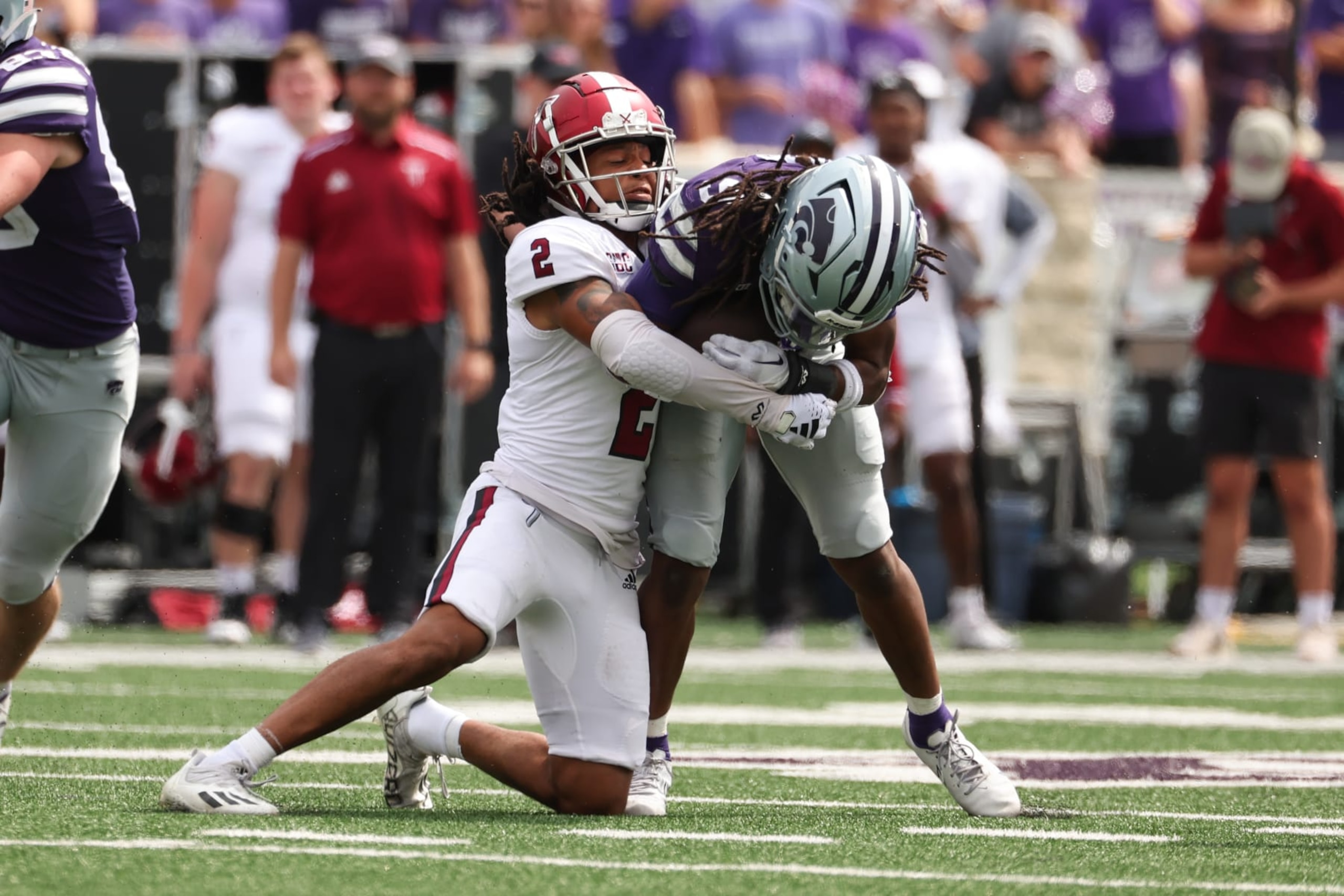 Reddy Steward makes a tackle against Kansas State during the 2023 college football season. 