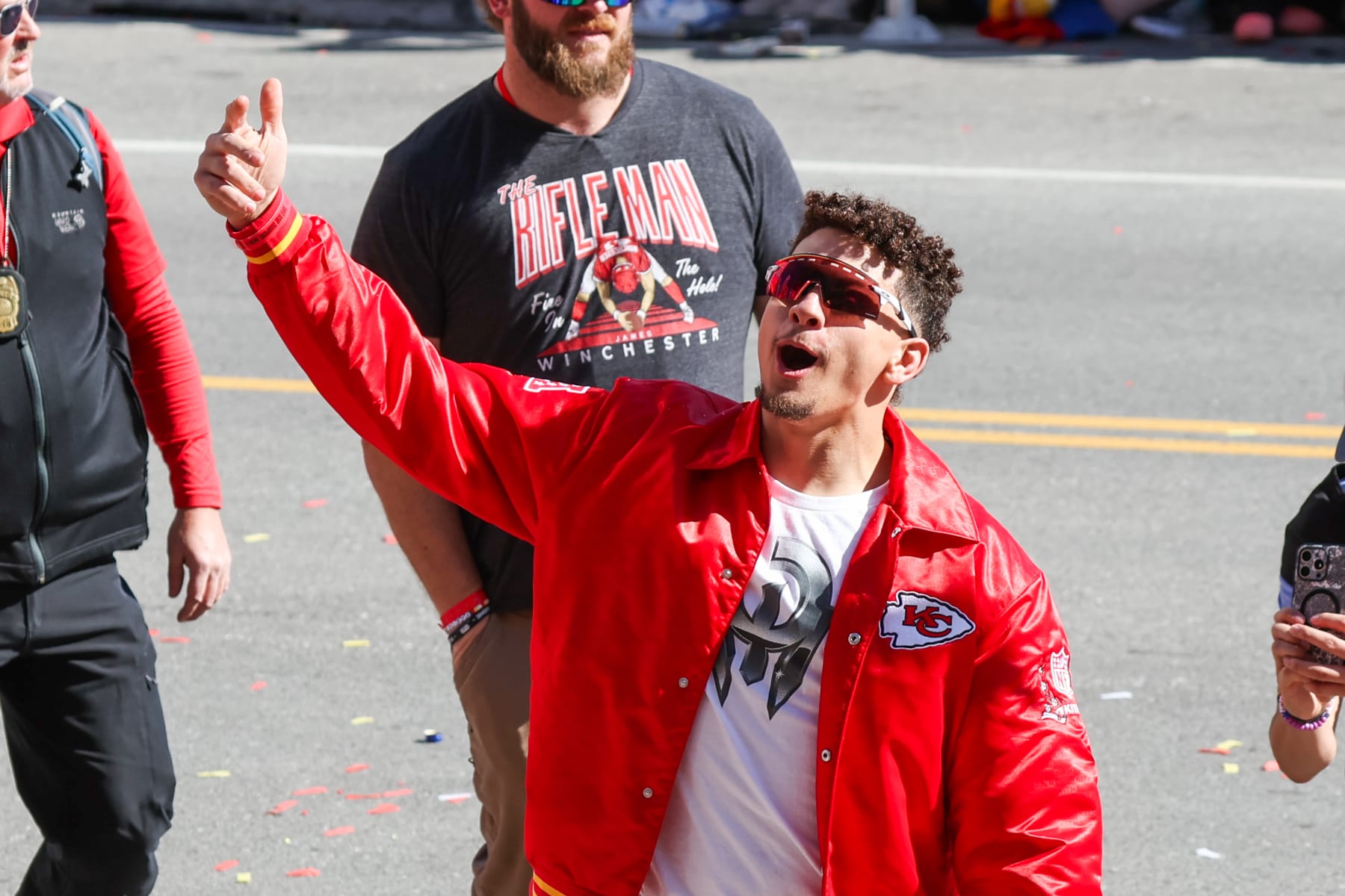 KANSAS CITY, MO - FEBRUARY 14: Patrick Mahomes looks up at the crowd and smiles during the Kansas City Chiefs Super Bowl LVIII Victory Parade on Feb 14, 2024 in Kansas City, MO. (Photo by Scott Winters/Icon Sportswire via Getty Images)