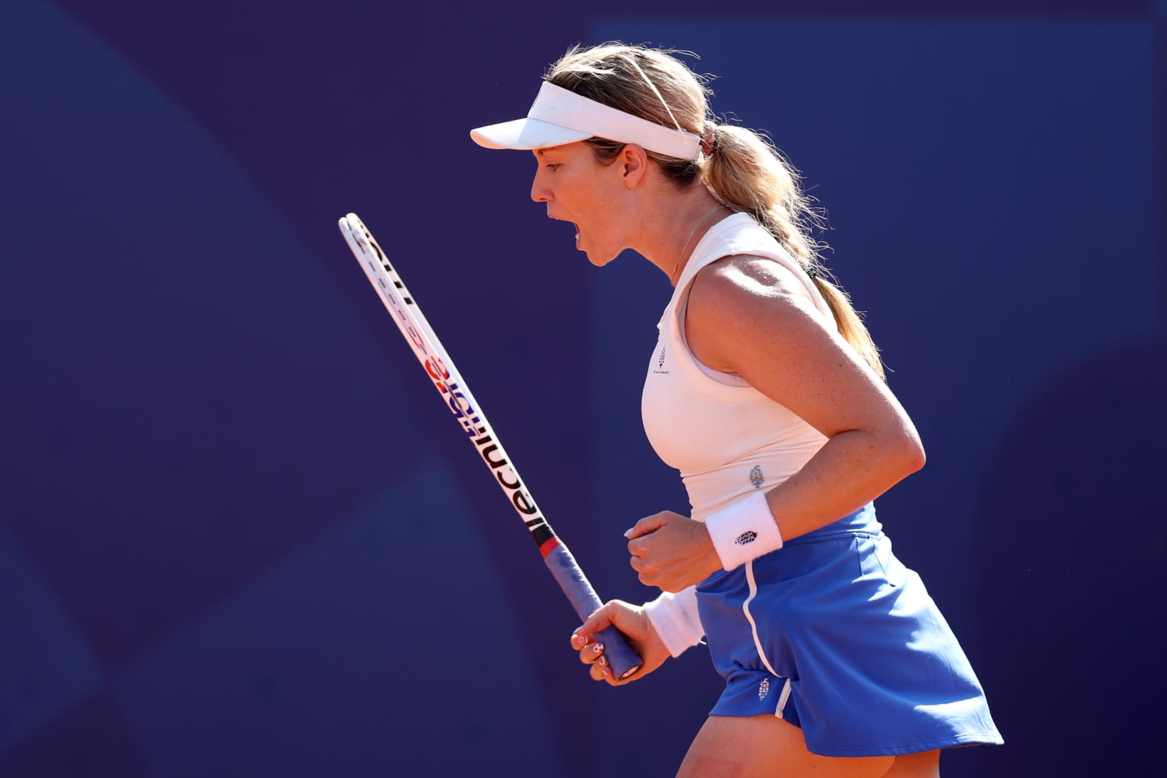 PARIS, FRANCE - JULY 29: Danielle Collins of Team United States reacts against Caroline Wozniacki of Team Denmark of China during the Women's Singles second round match on day three of the Olympic Games Paris 2024 at Roland Garros on July 29, 2024 in Paris, France. (Photo by Matthew Stockman/Getty Images) PARIS, FRANCE - JULY 29: Danielle Collins of Team United States reacts against Caroline Wozniacki of Team Denmark of China during the Women's Singles second round match on day three of the Olympic Games Paris 2024 at Roland Garros on July 29, 2024 in Paris, France. (Photo by Matthew Stockman/Getty Images)
