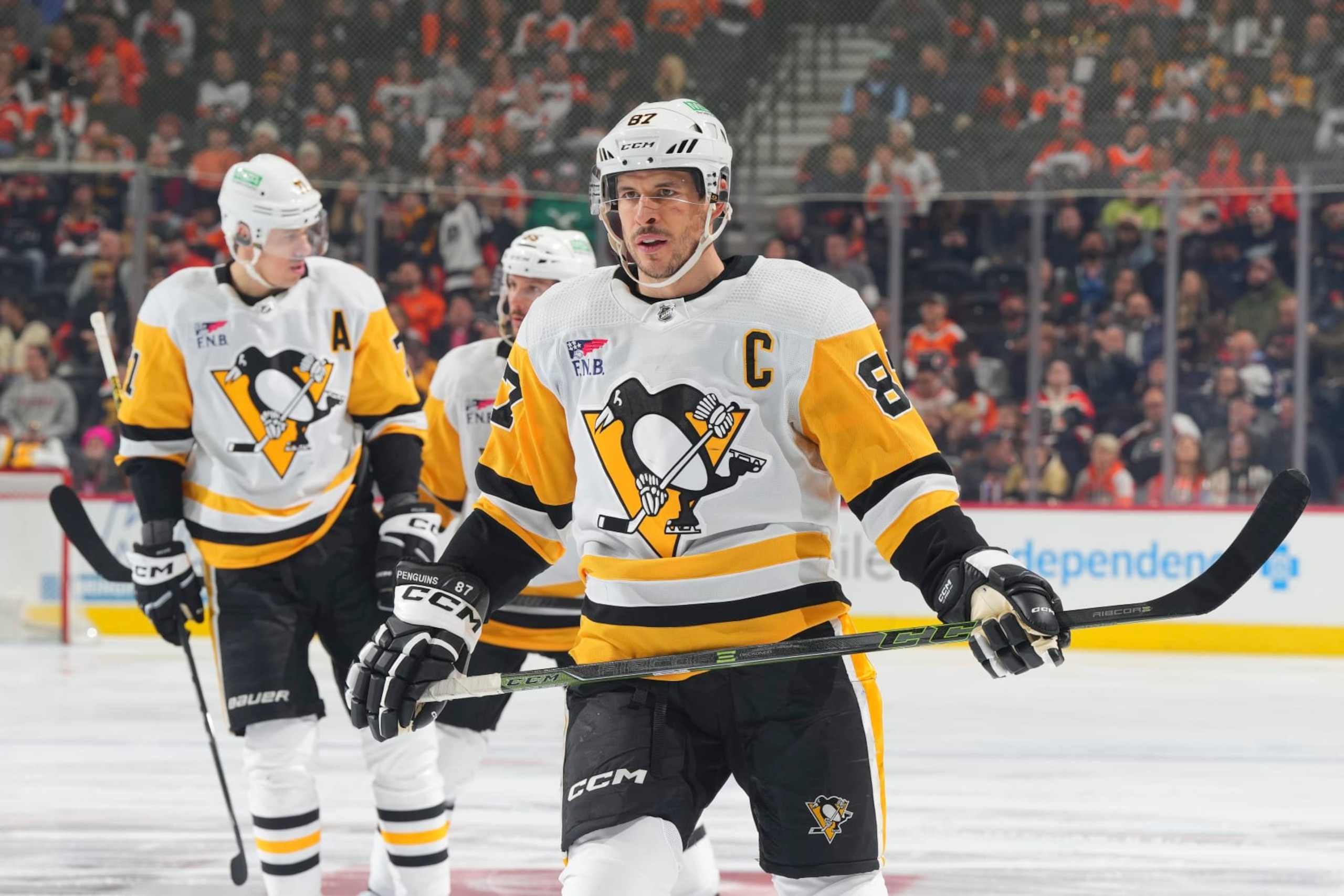 PHILADELPHIA, PENNSYLVANIA - JANUARY 8: Sidney Crosby #87 and Evgeni Malkin #71 of the Pittsburgh Penguins look on against the Philadelphia Flyers at the Wells Fargo Center on January 8, 2024 in Philadelphia, Pennsylvania. (Photo by Mitchell Leff/Getty Images) PHILADELPHIA, PENNSYLVANIA - JANUARY 8: Sidney Crosby #87 and Evgeni Malkin #71 of the Pittsburgh Penguins look on against the Philadelphia Flyers at the Wells Fargo Center on January 8, 2024 in Philadelphia, Pennsylvania. (Photo by Mitchell Leff/Getty Images)