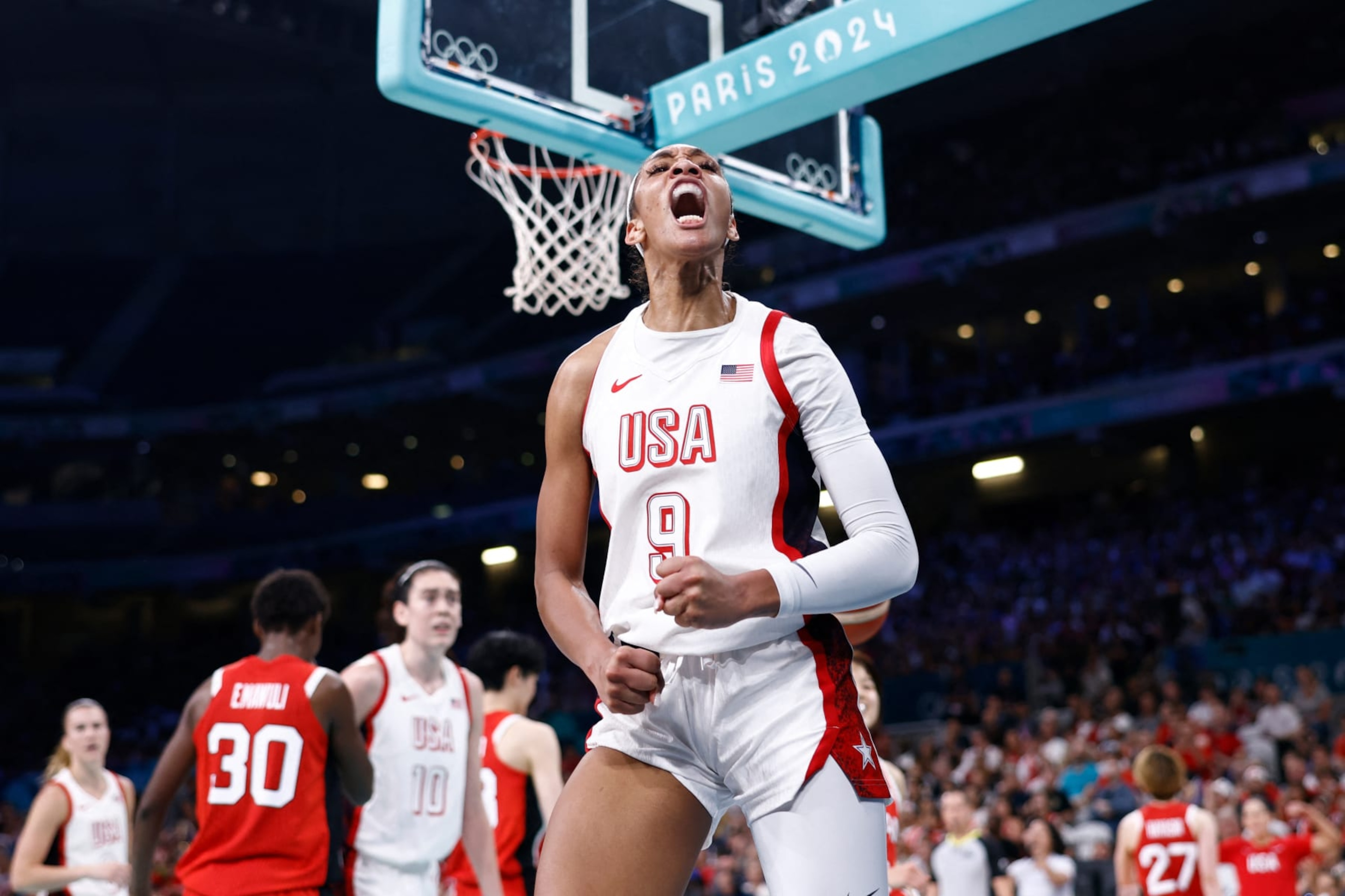 USA's #09 A'ja Wilson celebrates after scoring in the women's preliminary round group C basketball match between USA and Japan during the Paris 2024 Olympic Games at the Pierre-Mauroy stadium in Villeneuve-d'Ascq, northern France, on July 29, 2024. (Photo by Sameer Al-Doumy / AFP) (Photo by SAMEER AL-DOUMY/AFP via Getty Images) USA's #09 A'ja Wilson celebrates after scoring in the women's preliminary round group C basketball match between USA and Japan during the Paris 2024 Olympic Games at the Pierre-Mauroy stadium in Villeneuve-d'Ascq, northern France, on July 29, 2024. (Photo by Sameer Al-Doumy / AFP) (Photo by SAMEER AL-DOUMY/AFP via Getty Images)