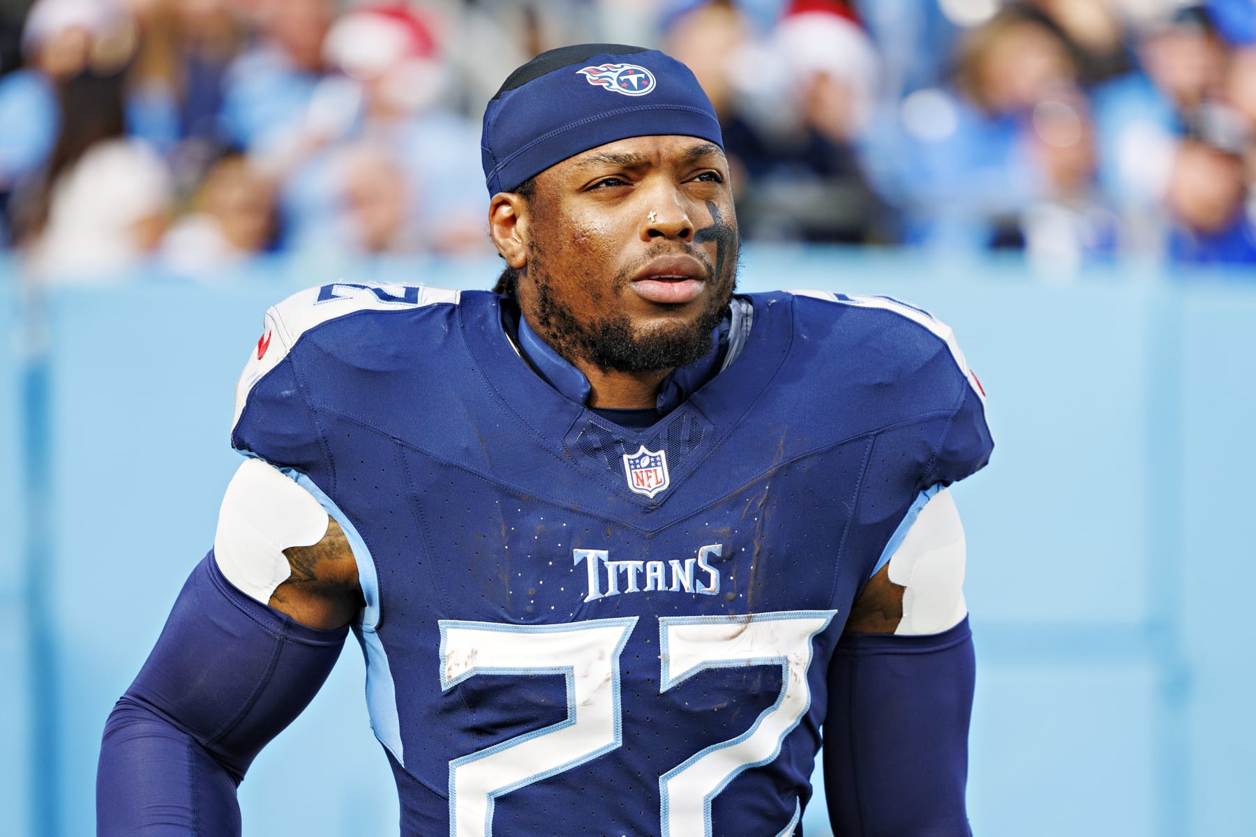 NASHVILLE, TENNESSEE - DECEMBER 24: Derrick Henry #22 of the Tennessee Titans jogs onto the field after halftime during the game against the Seattle Seahawks at Nissan Stadium on December 24, 2023 in Nashville, Tennessee. The Seahawks defeated the Titans 20-17.  (Photo by Wesley Hitt/Getty Images)