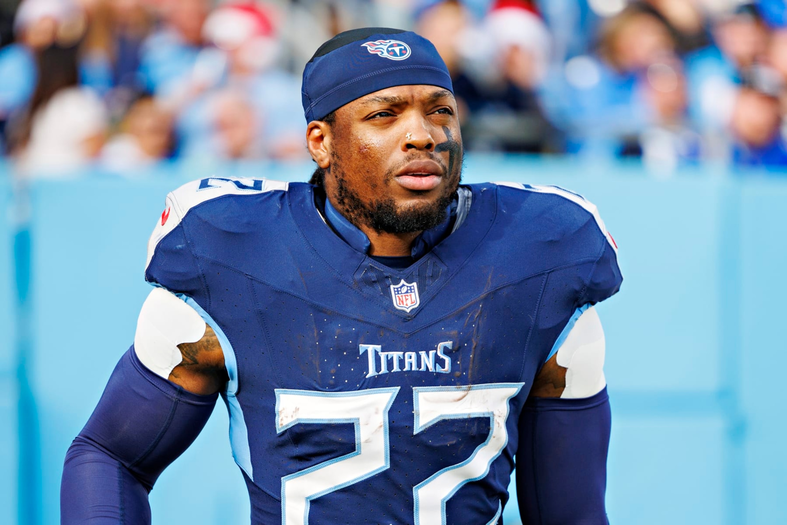 NASHVILLE, TENNESSEE - DECEMBER 24: Derrick Henry #22 of the Tennessee Titans jogs onto the field after halftime during the game against the Seattle Seahawks at Nissan Stadium on December 24, 2023 in Nashville, Tennessee. The Seahawks defeated the Titans 20-17. (Photo by Wesley Hitt/Getty Images) NASHVILLE, TENNESSEE - DECEMBER 24: Derrick Henry #22 of the Tennessee Titans jogs onto the field after halftime during the game against the Seattle Seahawks at Nissan Stadium on December 24, 2023 in Nashville, Tennessee. The Seahawks defeated the Titans 20-17. (Photo by Wesley Hitt/Getty Images)