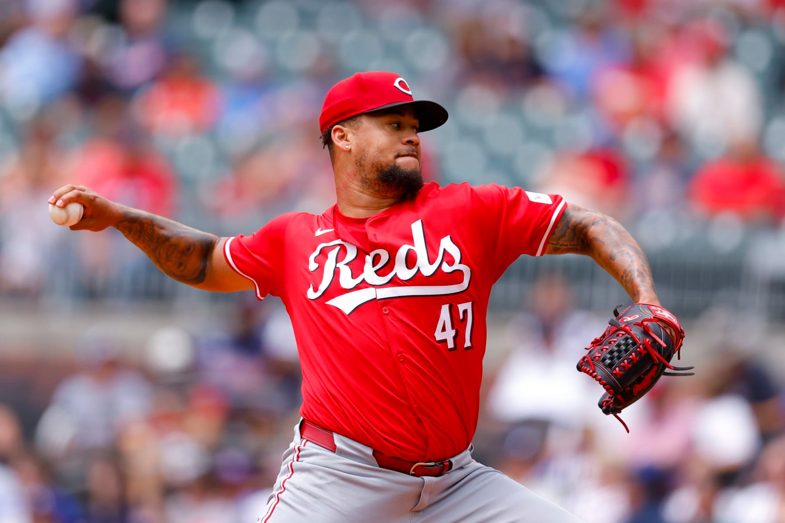 ATLANTA, GEORGIA - JULY 24: Frankie Montas #47 of the Cincinnati Reds pitches during the first inning against the Atlanta Braves in game one of a split double header at Truist Park on July 24, 2024 in Atlanta, Georgia. (Photo by Todd Kirkland/Getty Images)
