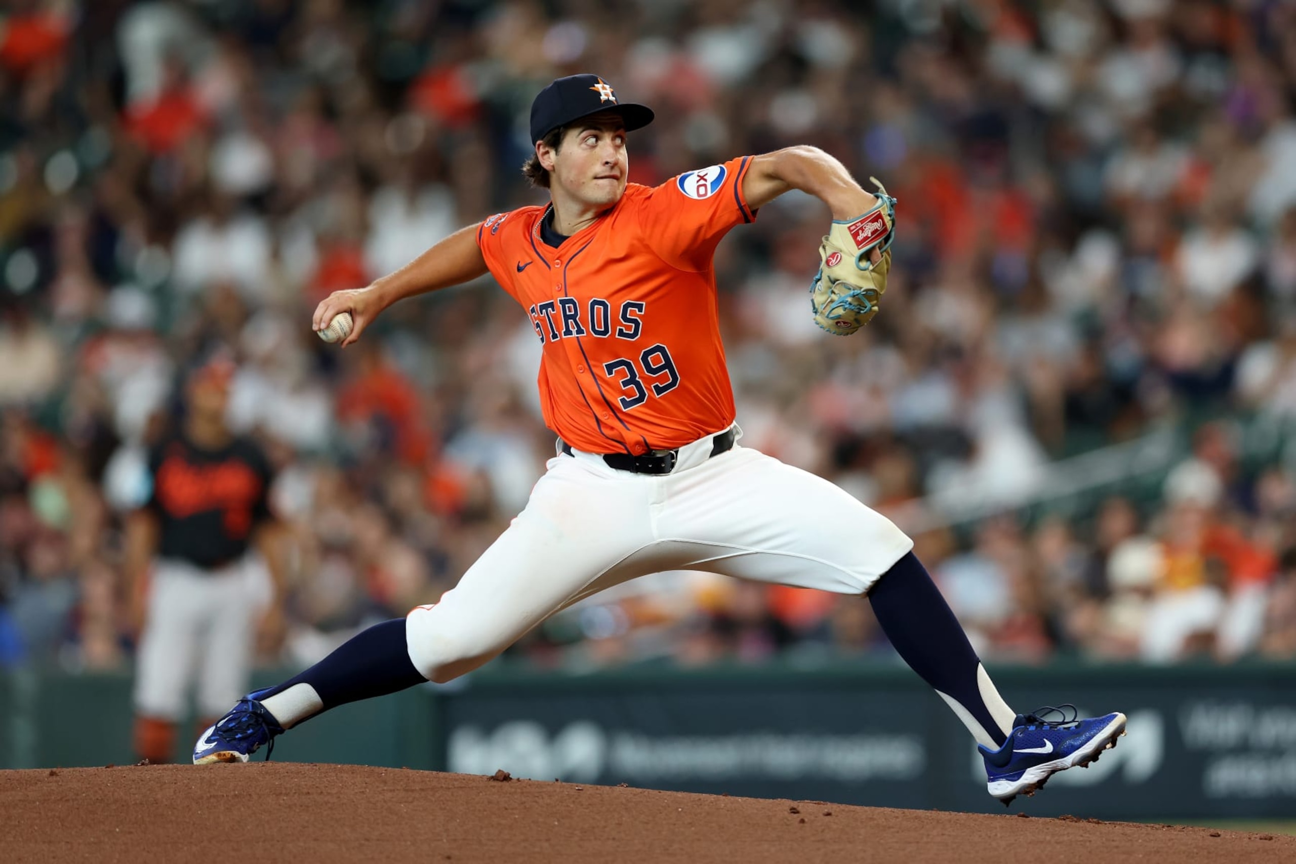 HOUSTON, TEXAS - JUNE 21: Jake Bloss #39 of the Houston Astros pitches in the first inning against the Baltimore Orioles at Minute Maid Park on June 21, 2024 in Houston, Texas. (Photo by Tim Warner/Getty Images)