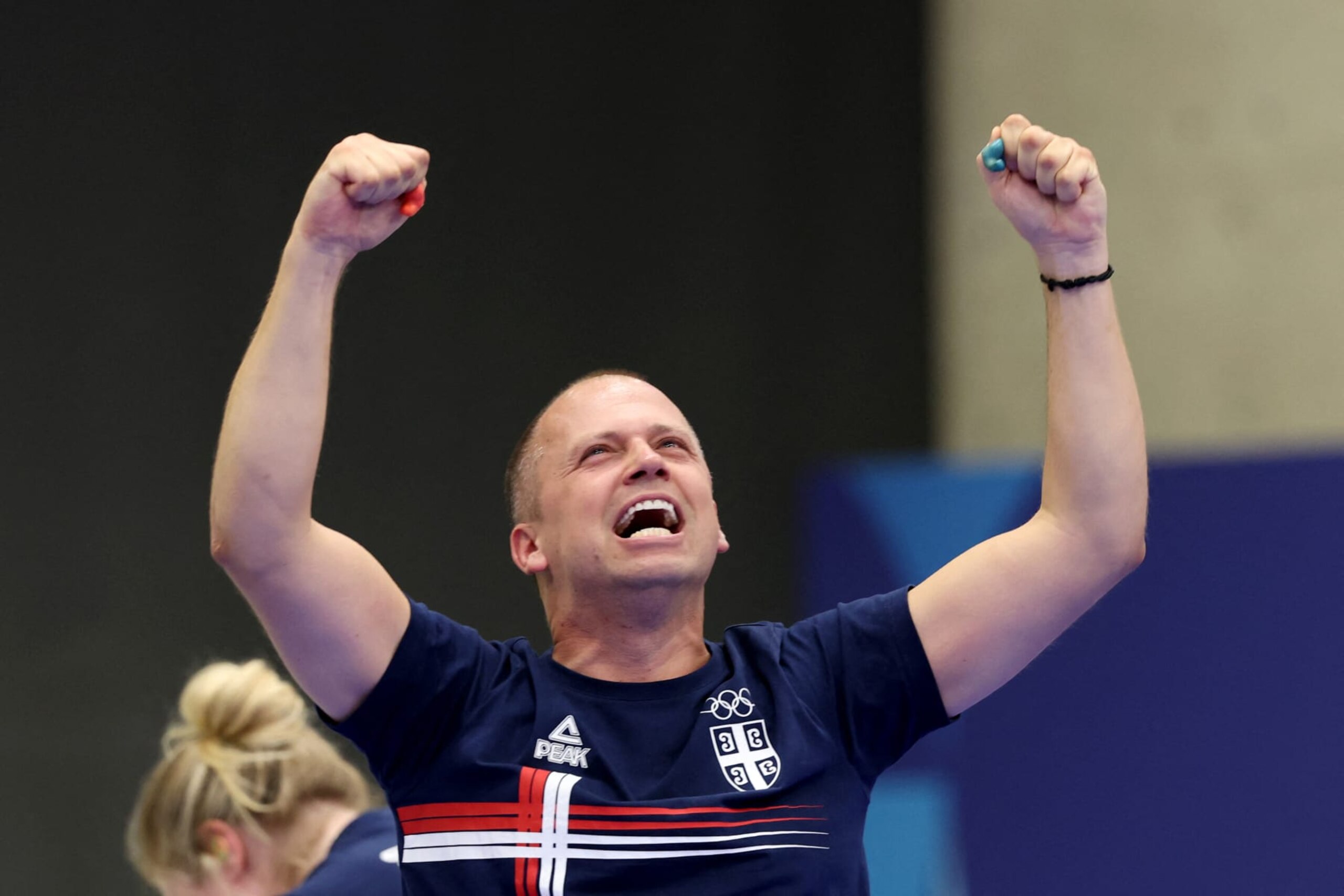 Serbia's Mikec Damir celebrates after winning the shooting 10m air pistol mixed team gold medal match during the Paris 2024 Olympic Games at Chateauroux Shooting Centre on July 30, 2024. (Photo by Alain JOCARD / AFP) (Photo by ALAIN JOCARD/AFP via Getty Images)