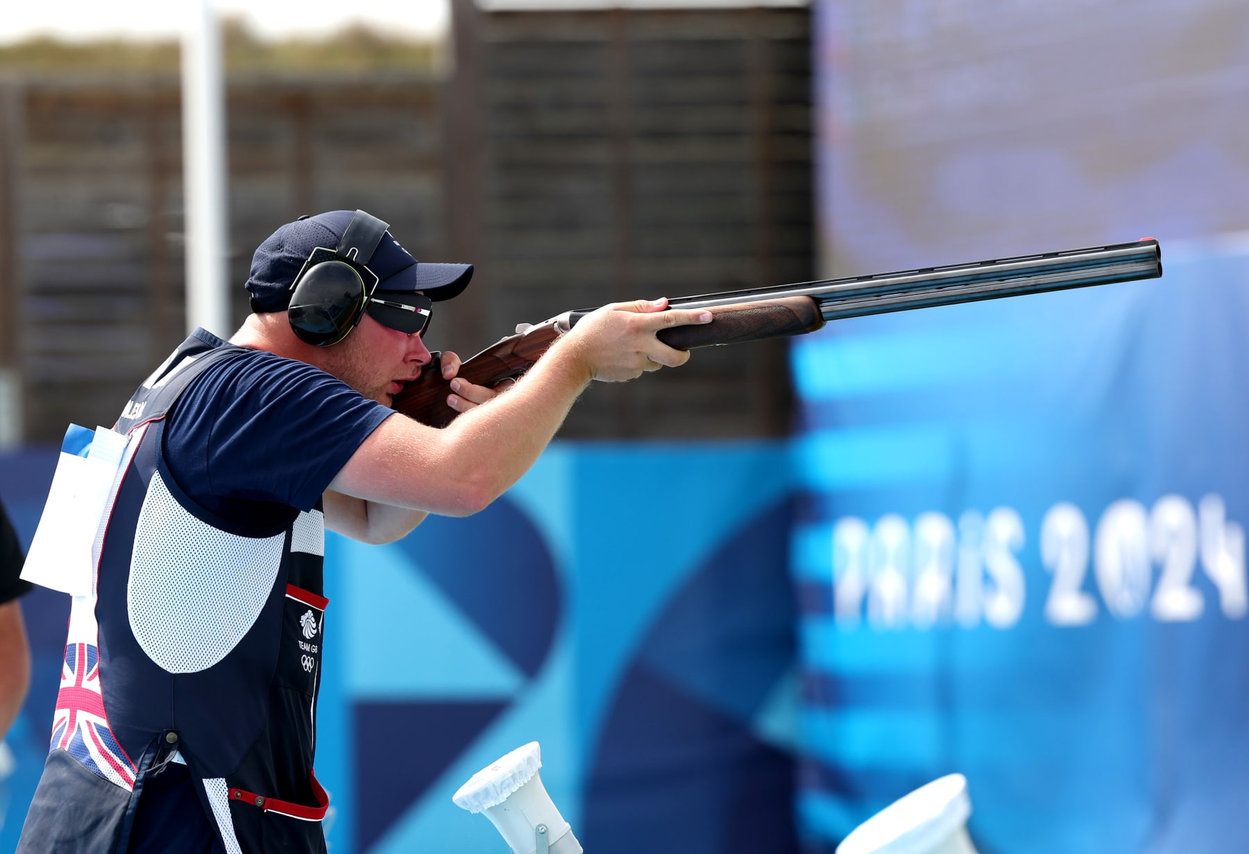 CHATEAUROUX, FRANCE - JULY 30: Nathan Hales of Team Great Britain competes in the Men’s Trap Final on day four of the Olympic Games Paris 2024 at Chateauroux Shooting Centre on July 30, 2024 in Chateauroux, France. (Photo by Charles McQuillan/Getty Images)